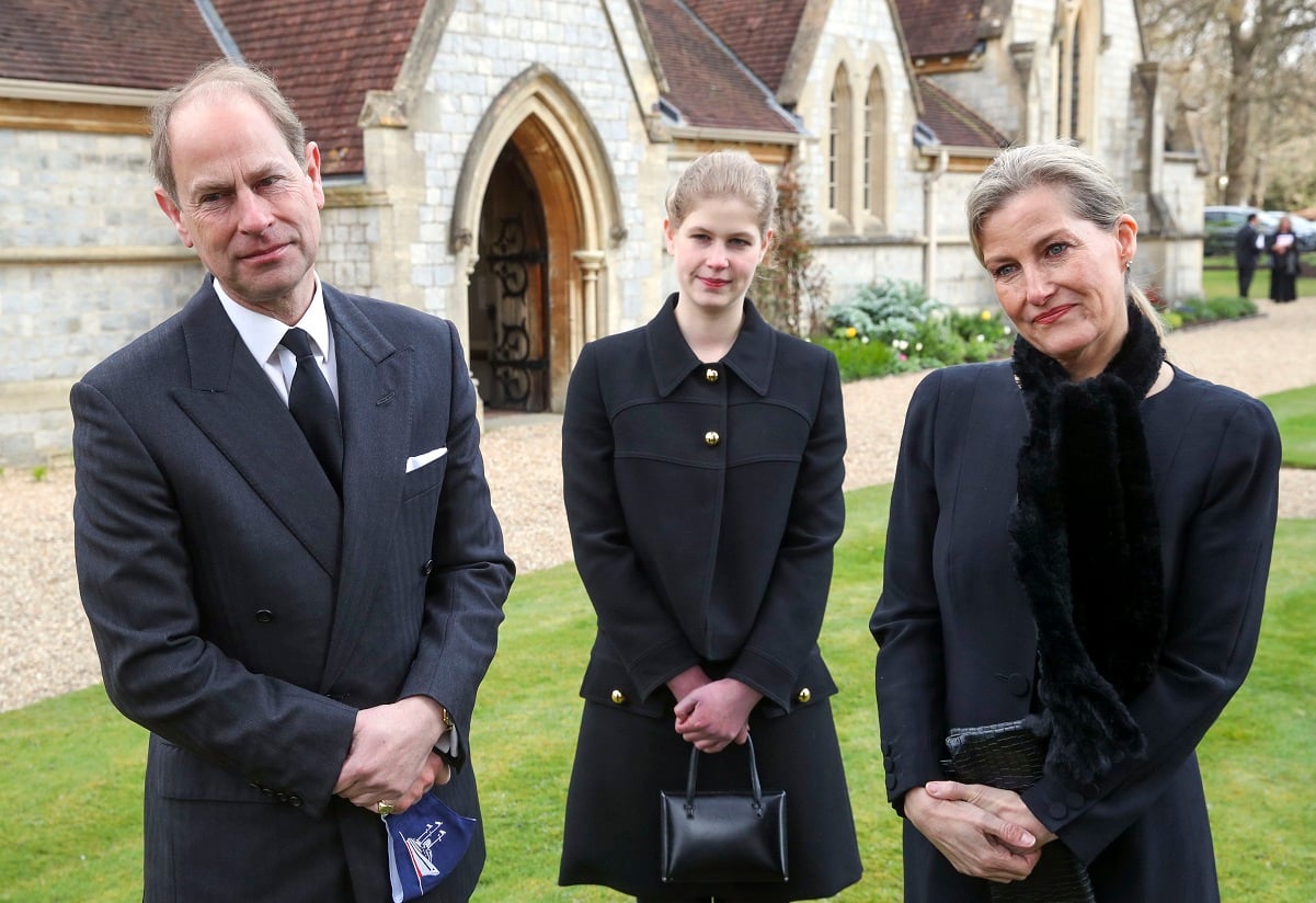 Prince Edward and his wife, Sophie, with their daughter Lady Louise Windsor standing outside church during a television interview following the announcement of Prince Philip's death
