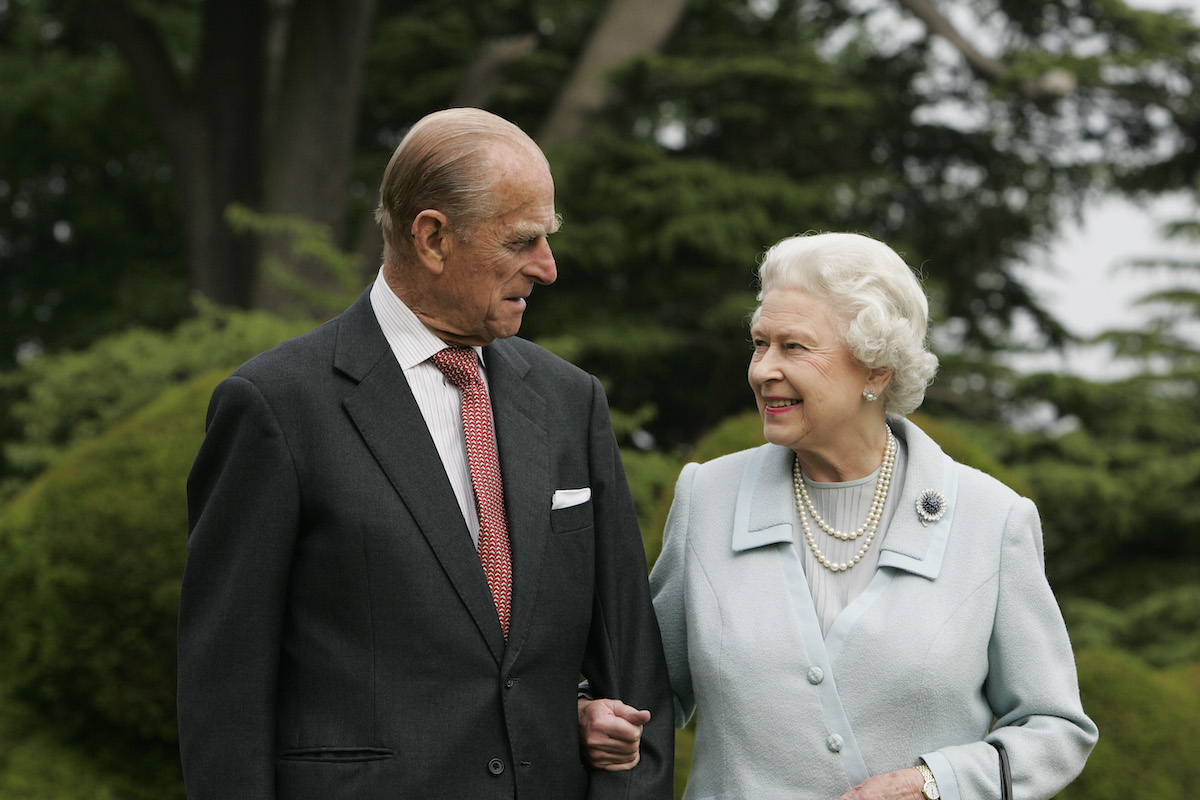 Queen Elizabeth II and Prince Philip, The Duke of Edinburgh smile at each other