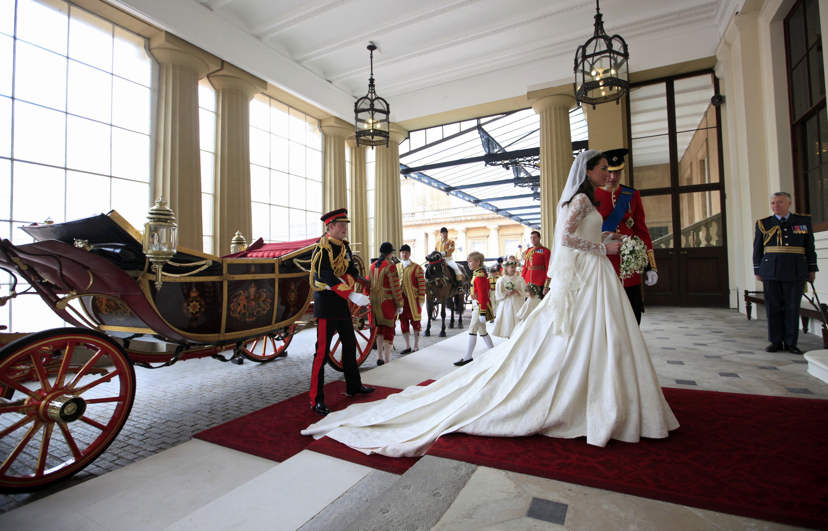 Prince William and Kate Middleton arrive at Buckingham Palace after their wedding ceremony 