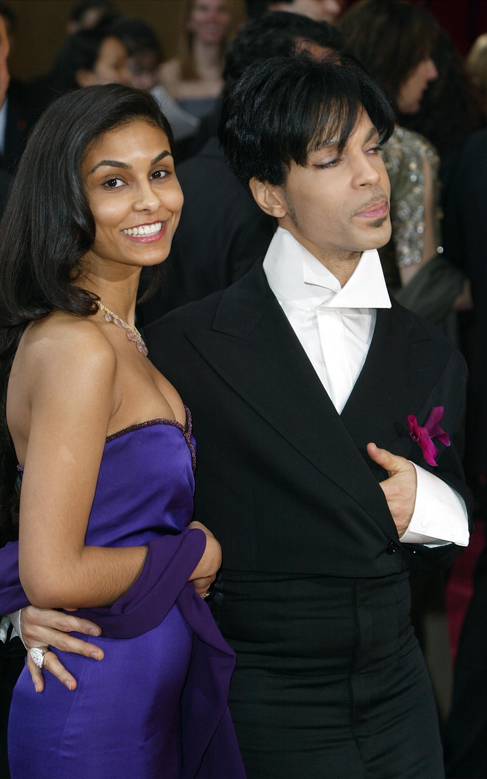 Prince arriving on the red carpet with his second wife, Manuela Testolini, at the 76th Annual Academy Awards