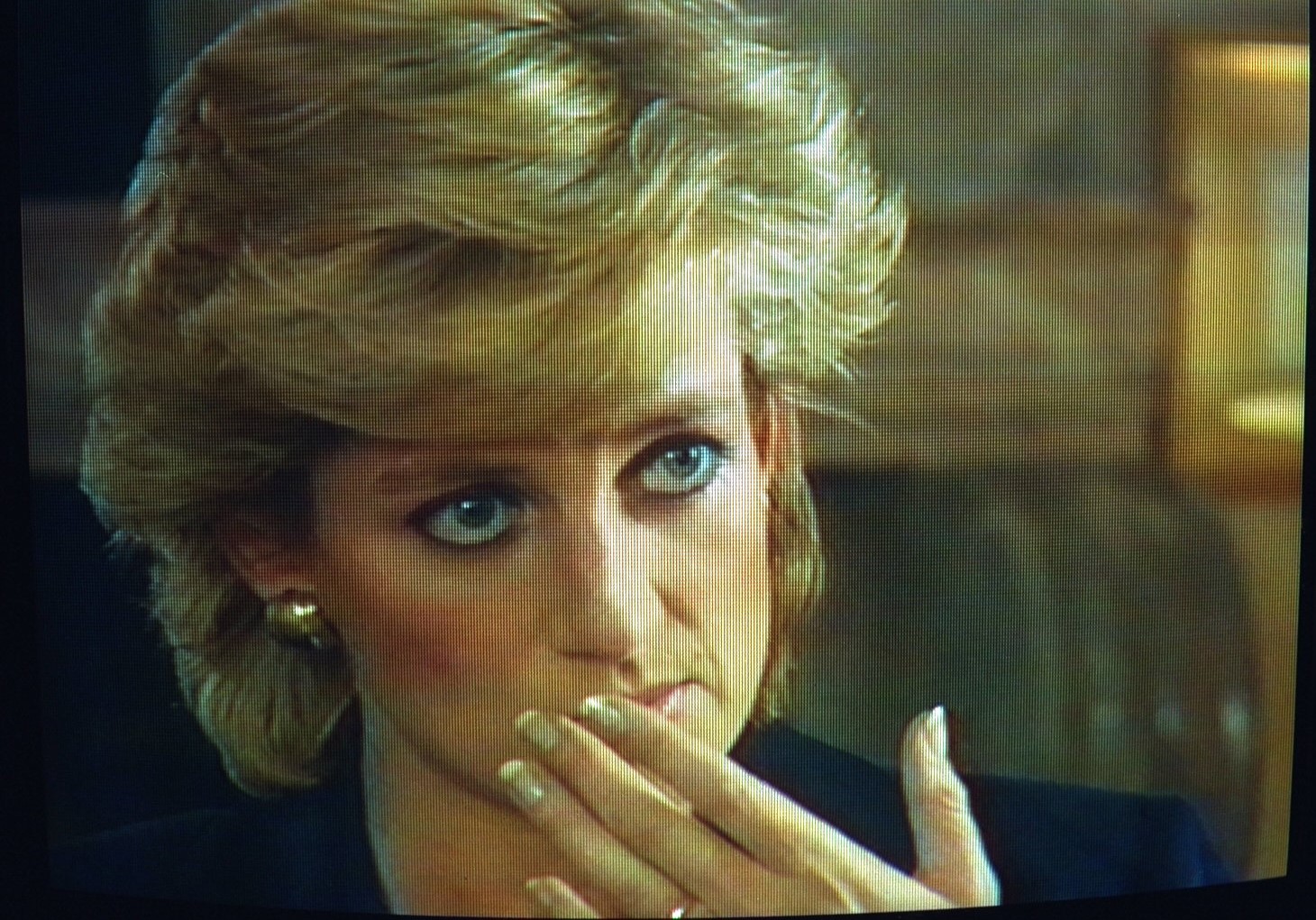 Headshot of Princess Diana holding her hand to her face during 'Panorama' interview