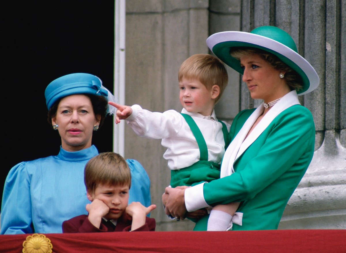 Diana, Princess Of Wales, Holding A Young Prince Harry In Her Arms As She Watches Trooping The Colour With Prince William And Princess Margaret From The Balcony Of Buckingham Palace