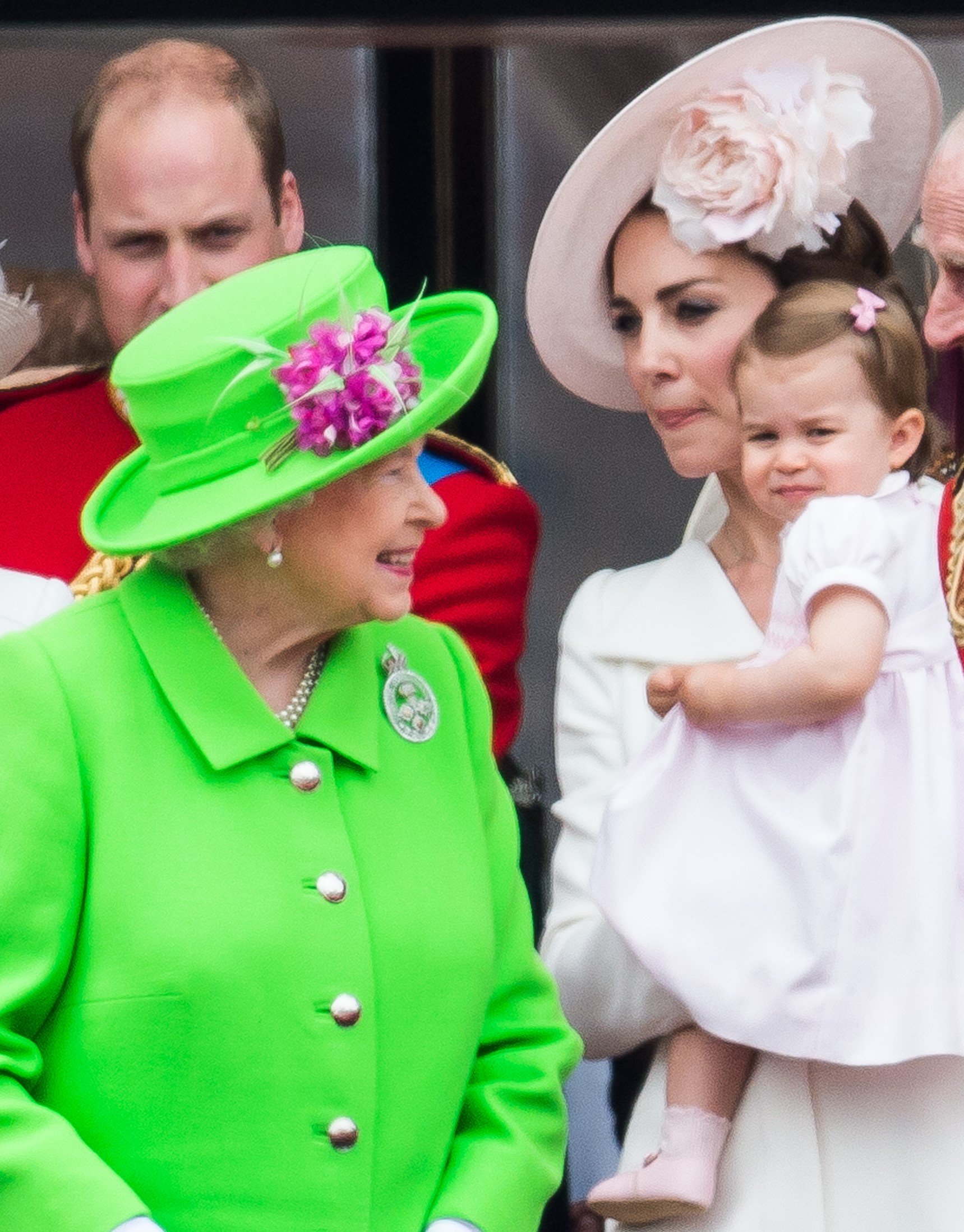 Queen Elizabeth II, Kate Middleton, and Princess Charlotte on the Buckingham Palace balcony during the Trooping the Colour