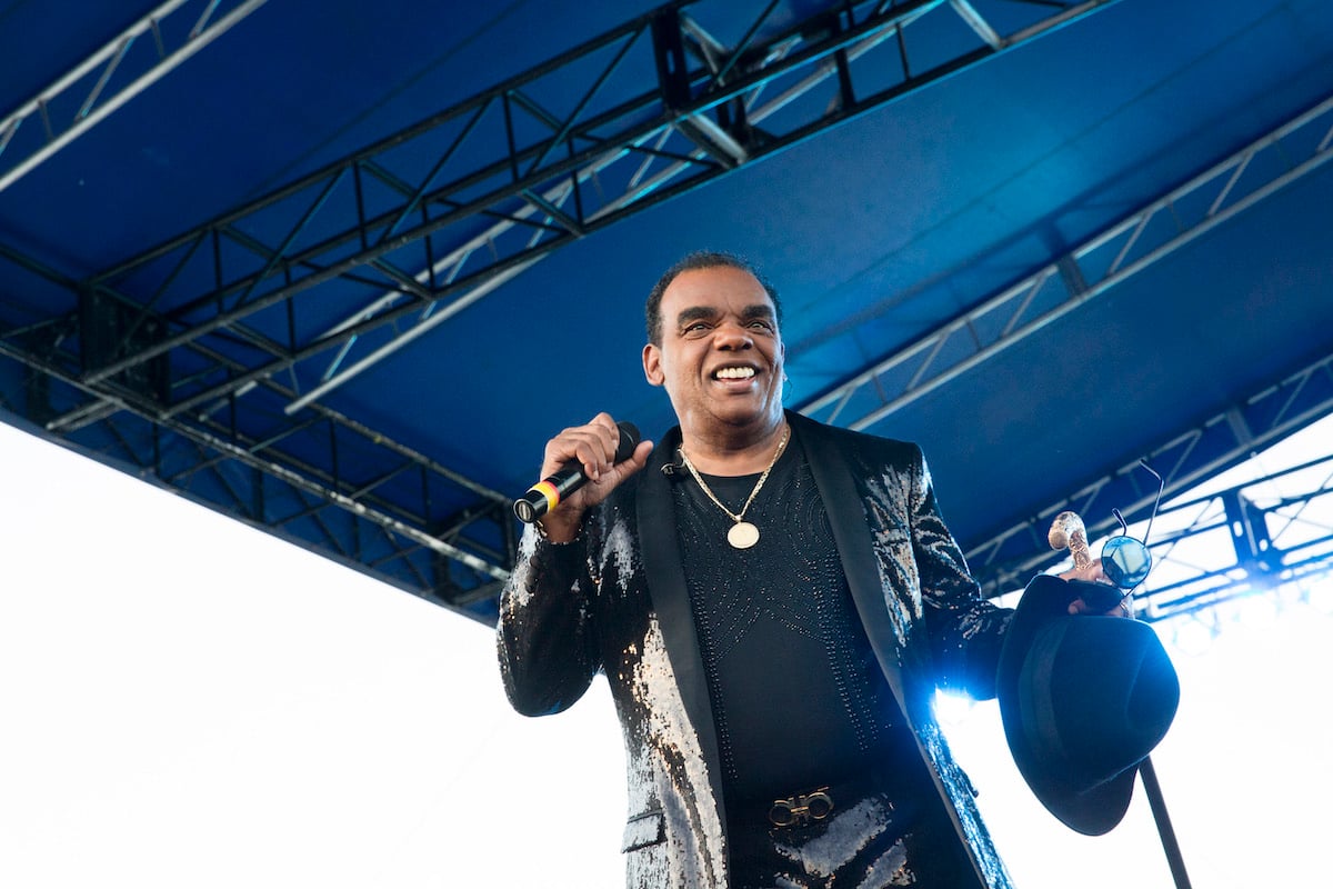 Singer Ronald Isley of The Isley Brothers singing on stage
