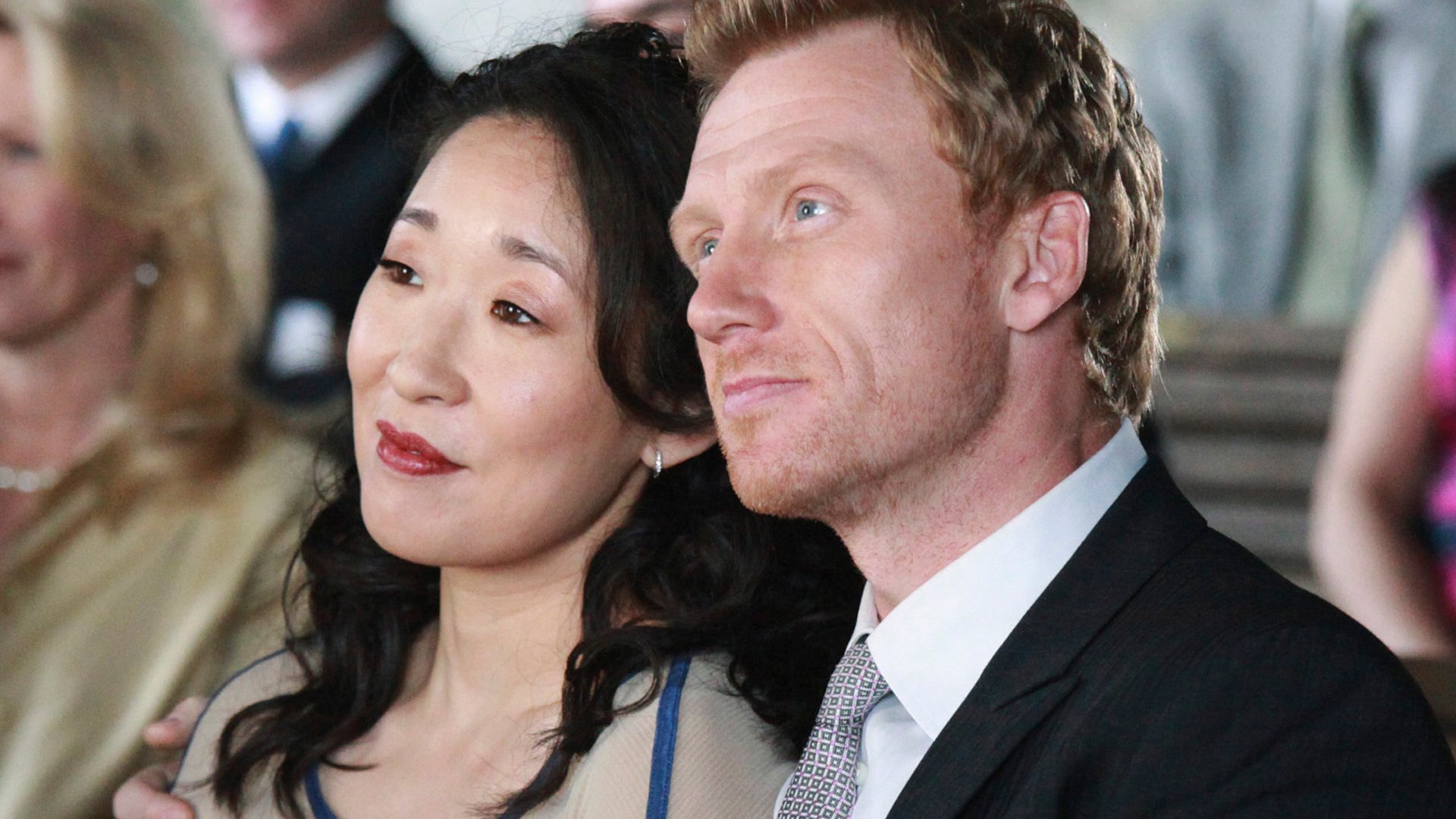Sandra Oh as Cristina Yang and Kevin McKidd as Owen Hunt together at a wedding in ‘Grey’s Anatomy’