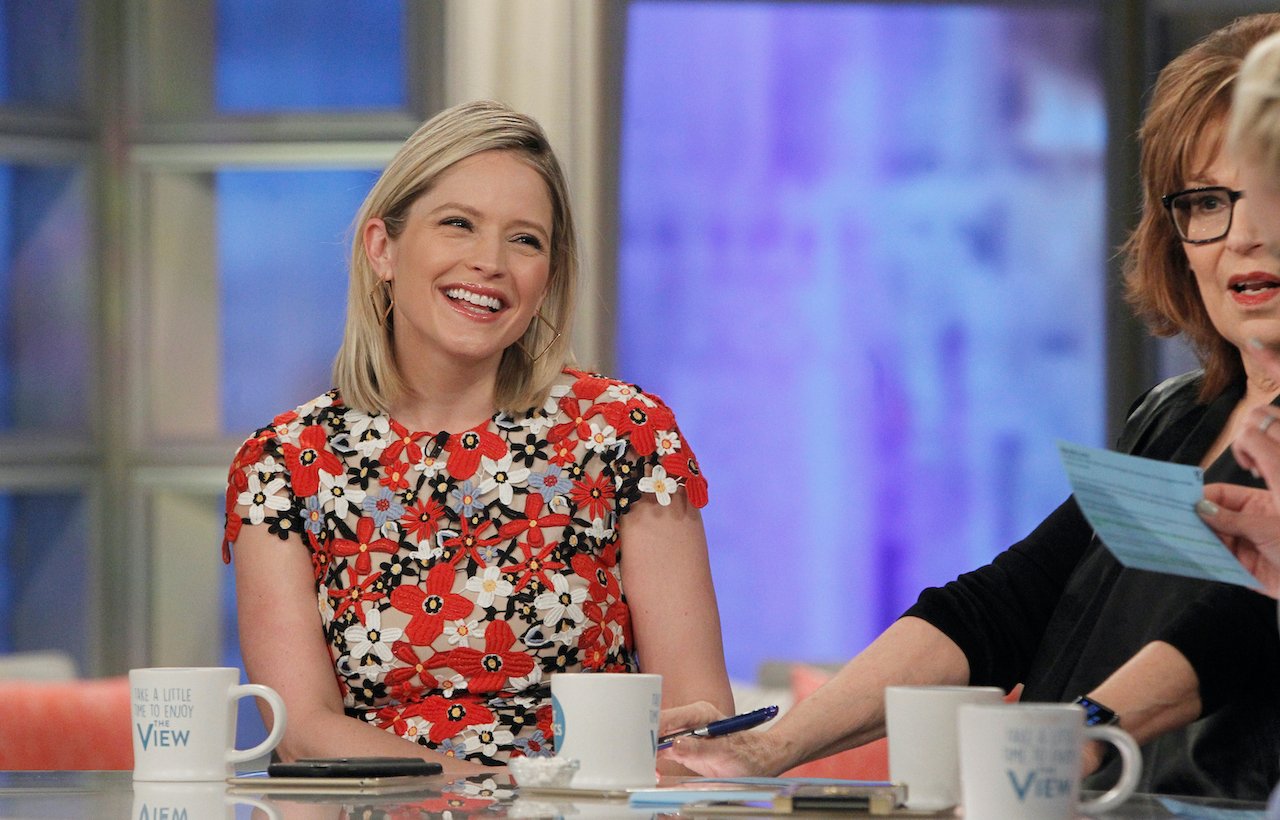 Sara Haines smiling at the desk of 'The View' 