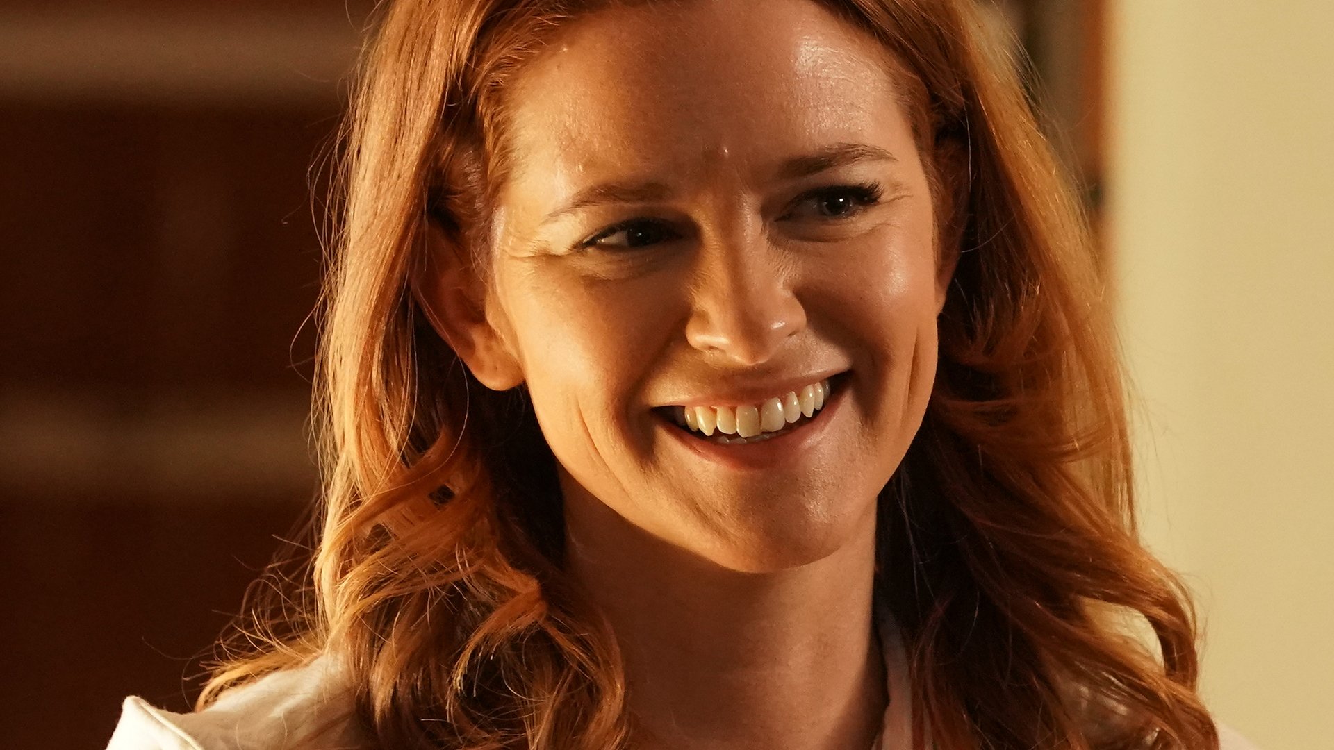 Sarah Drew as April Kepner smiling when Jackson Avery (Jesse Williams) returns to her home in ‘Grey’s Anatomy’ Season 17 Episode 14, ‘ Look Up Child,’ on May 6, 2021.