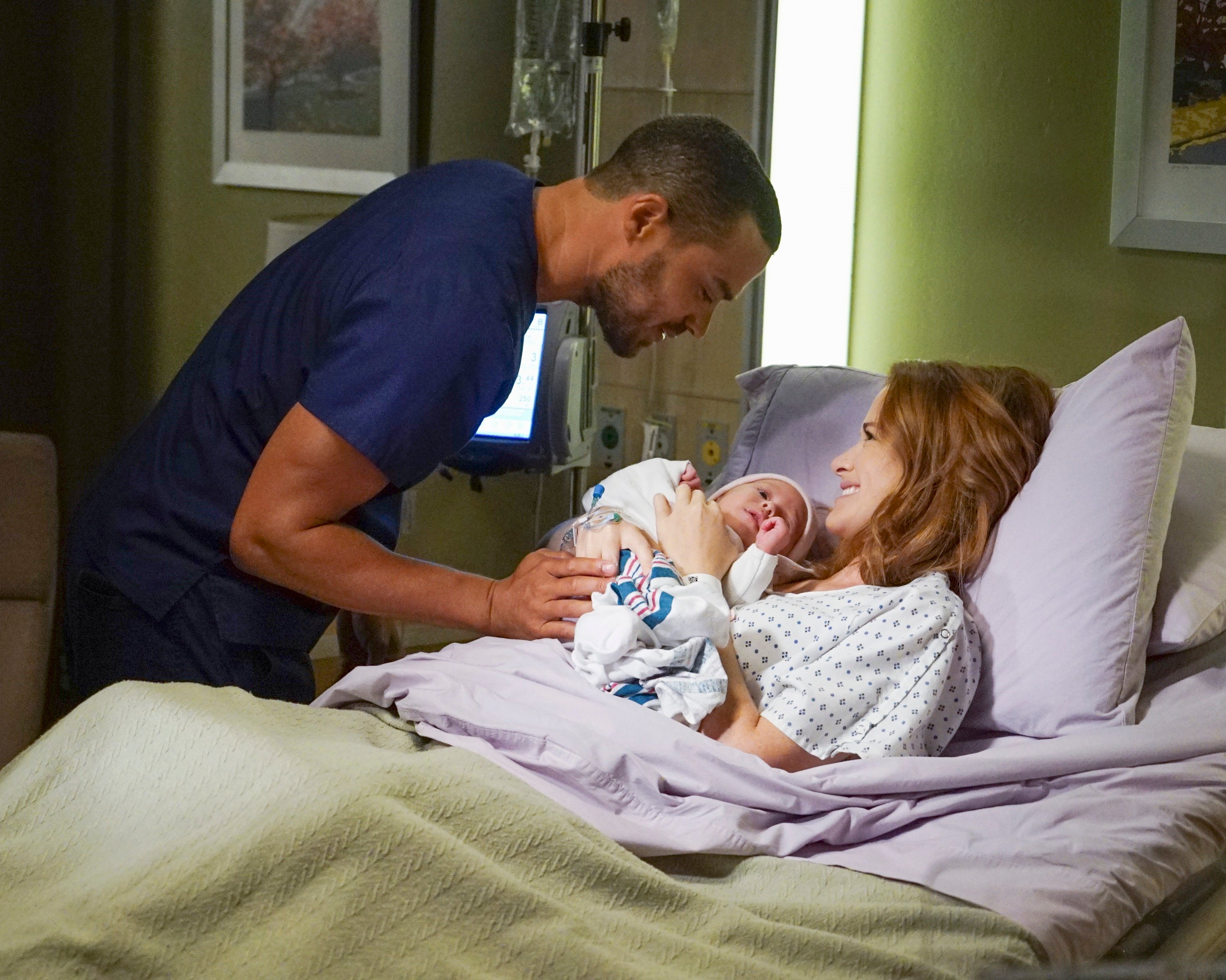 Sarah Drew and Jesse Williams with their child
