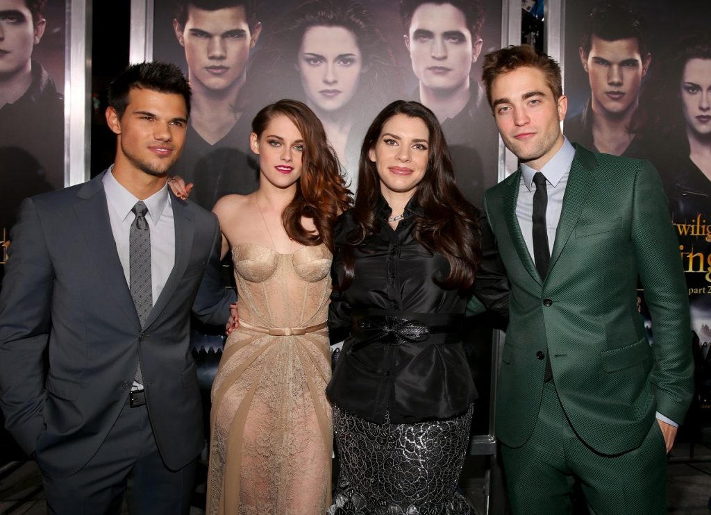 Taylor Lautner, Kristen Stewart, Stephenie Meyer, and Robert Pattinson walk the red carpet of the final Twilight movies