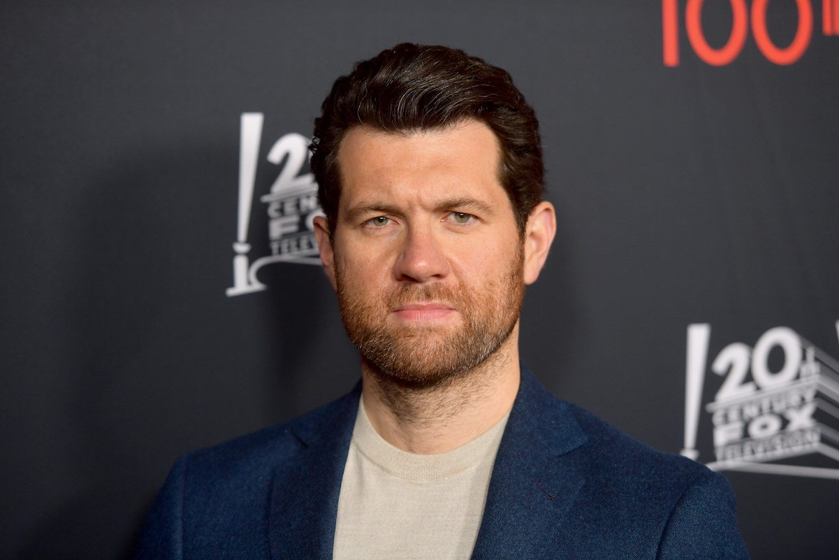 Billy Eichner in a bluet suit celebrating 100th episode of 'American Horror Story'