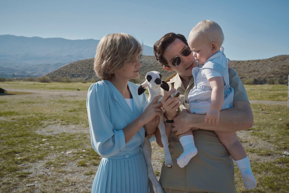 Princess Diana (Emma Corrin) and Prince Charles (Josh O'Connor) in 'The Crown' looking at baby Prince William