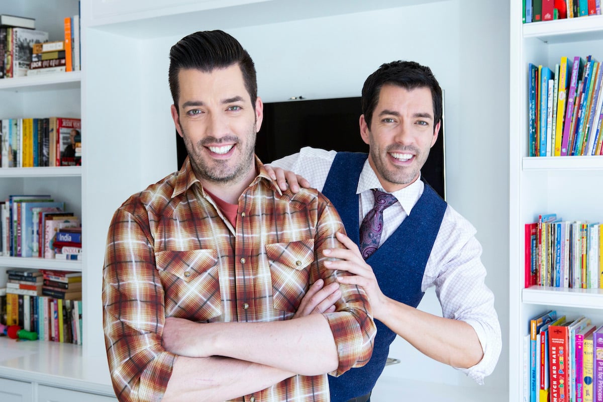 Drew and Jonathan Scott pose for a photo shoot