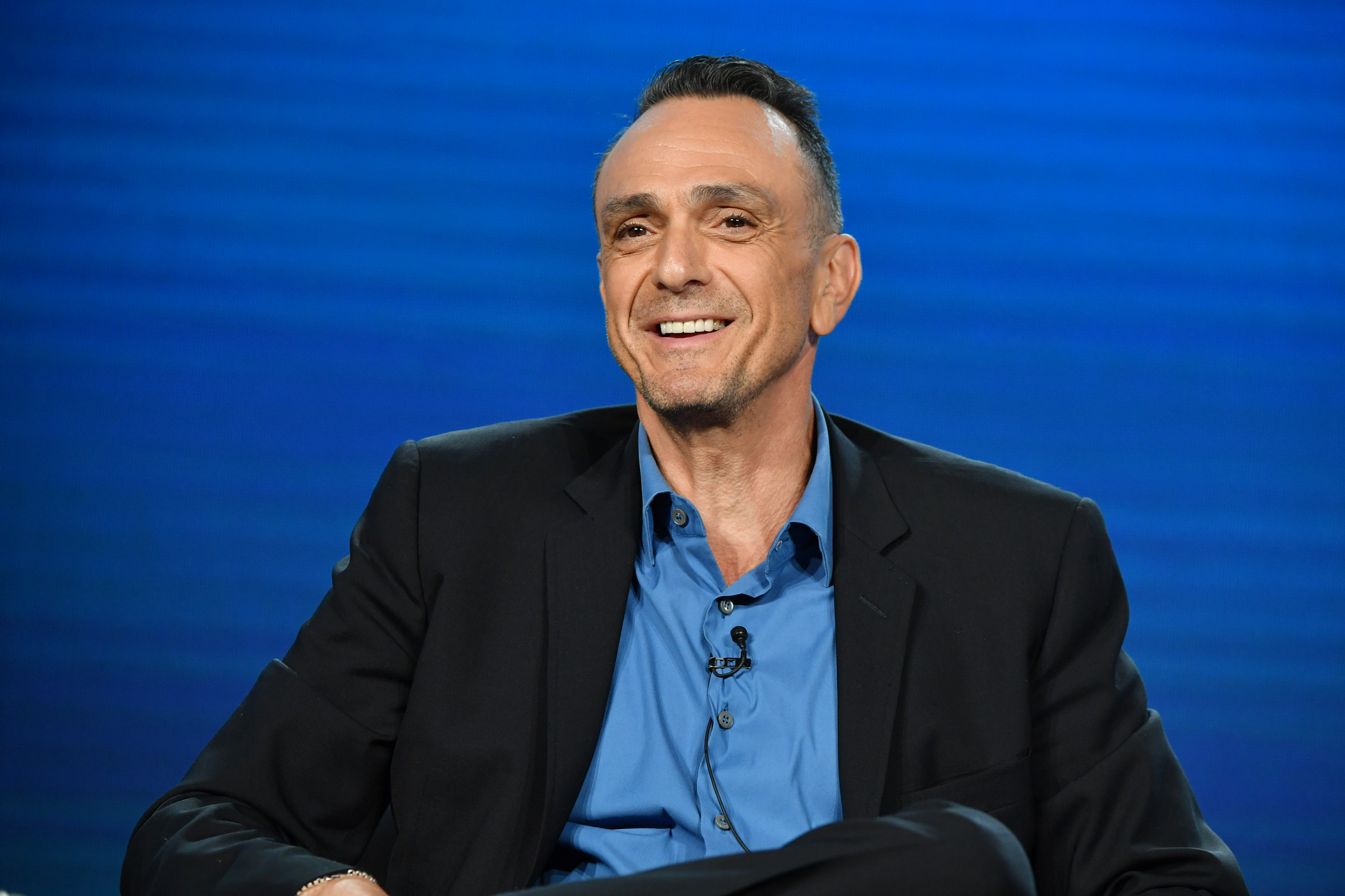 The Simpsons voice actor Hank Azaria sits on a TCA panel