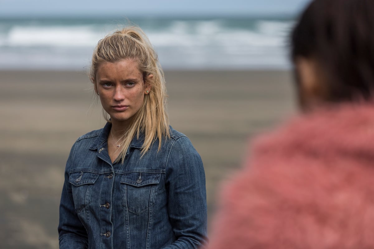 'The Wilds' Mia Healey in character of Shelby Goodkind wearing a jean jacket