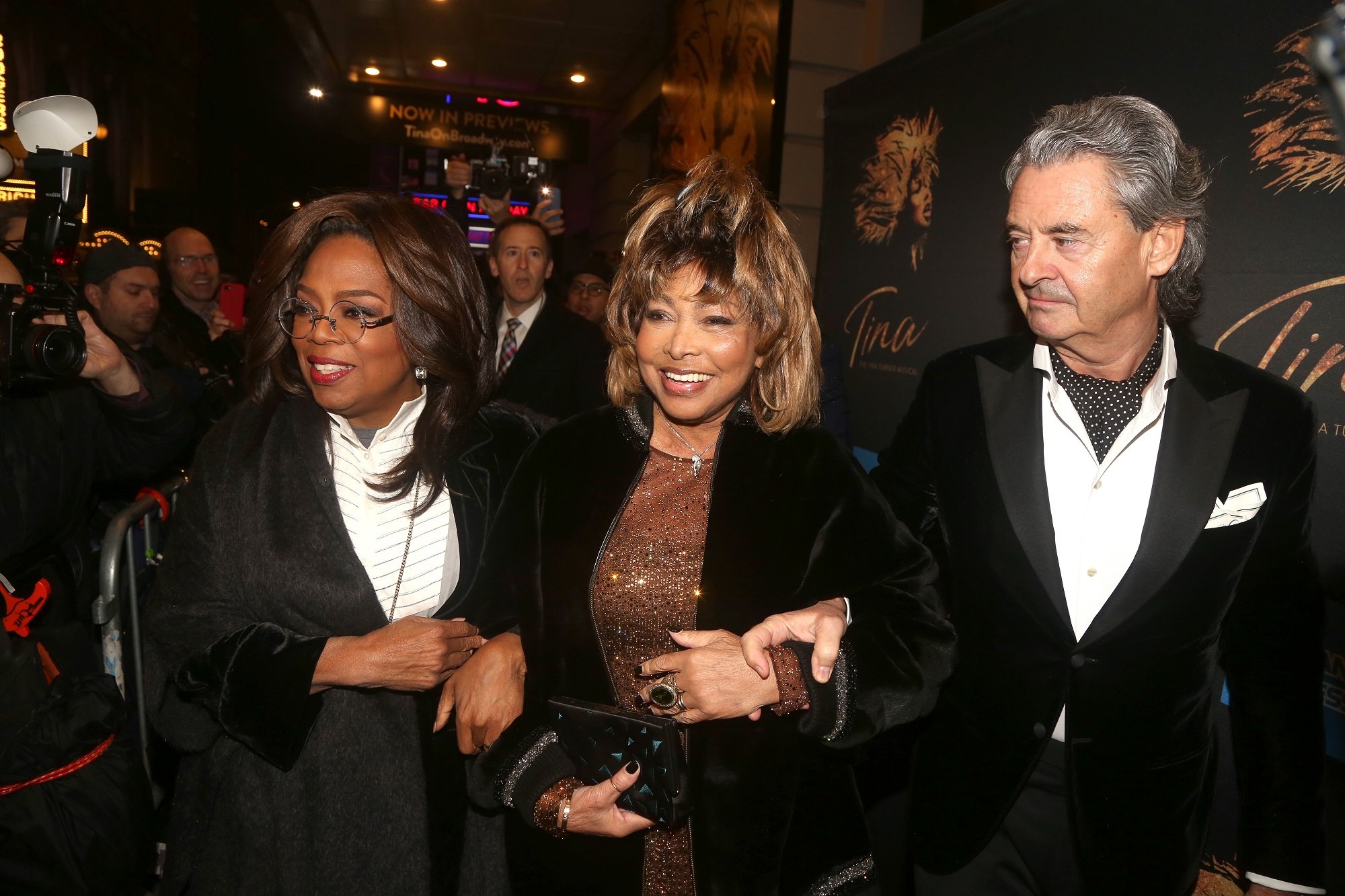 Tina Turner and Erwin Bach with Oprah Winfrey at the premiere of Tina the musical