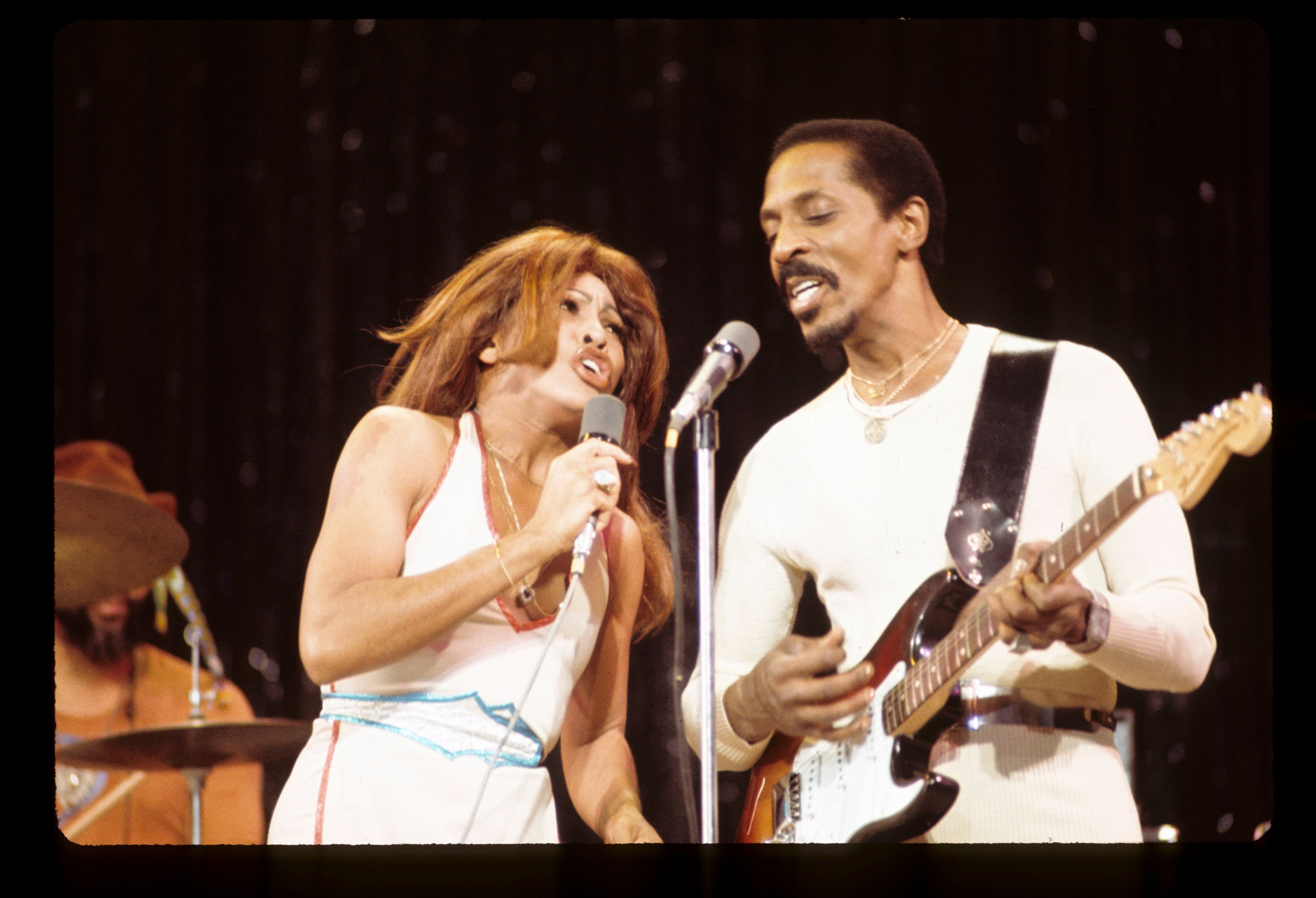Tina Turner sings while Ike Turner plays guitar
