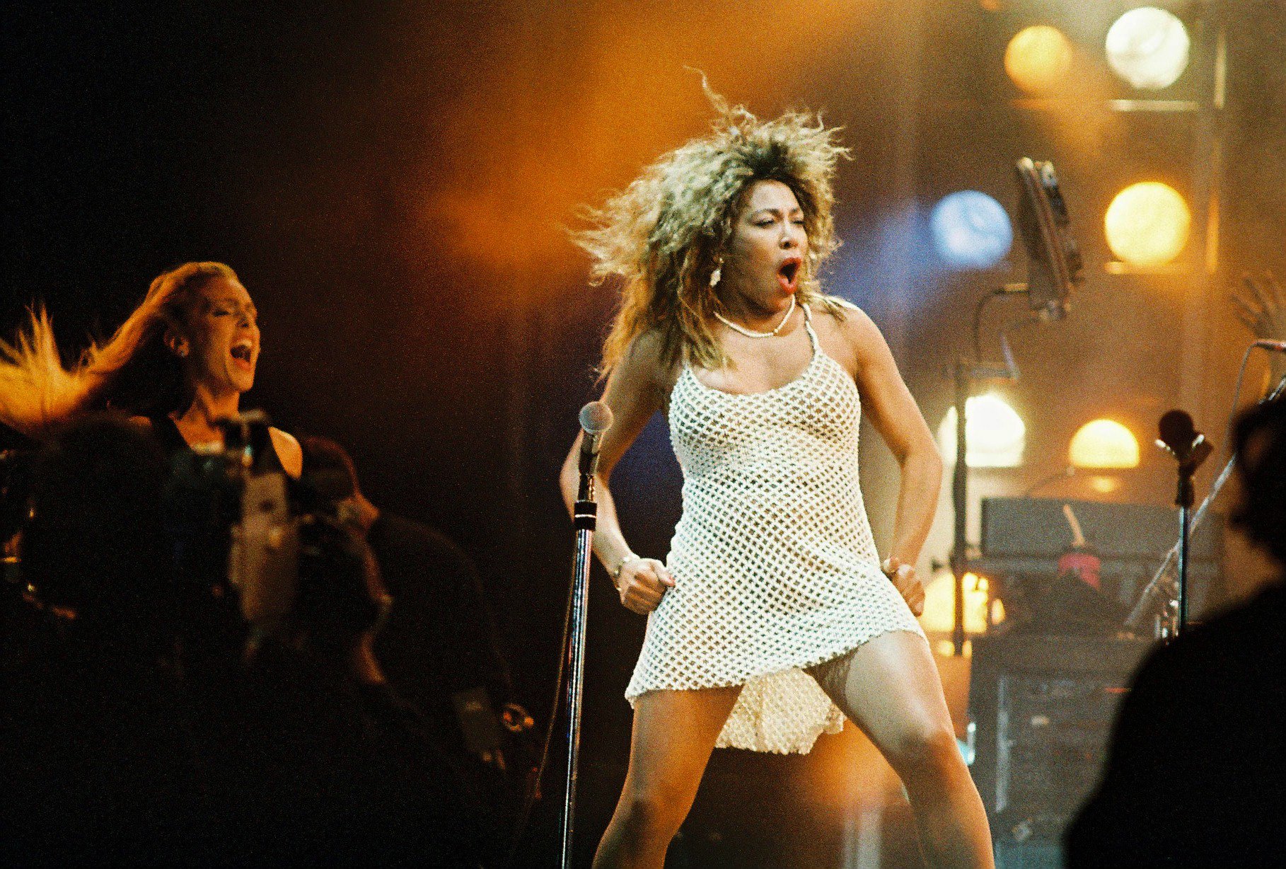 Tina Turner dancing and singing at her 'Foreign Affair' tour.