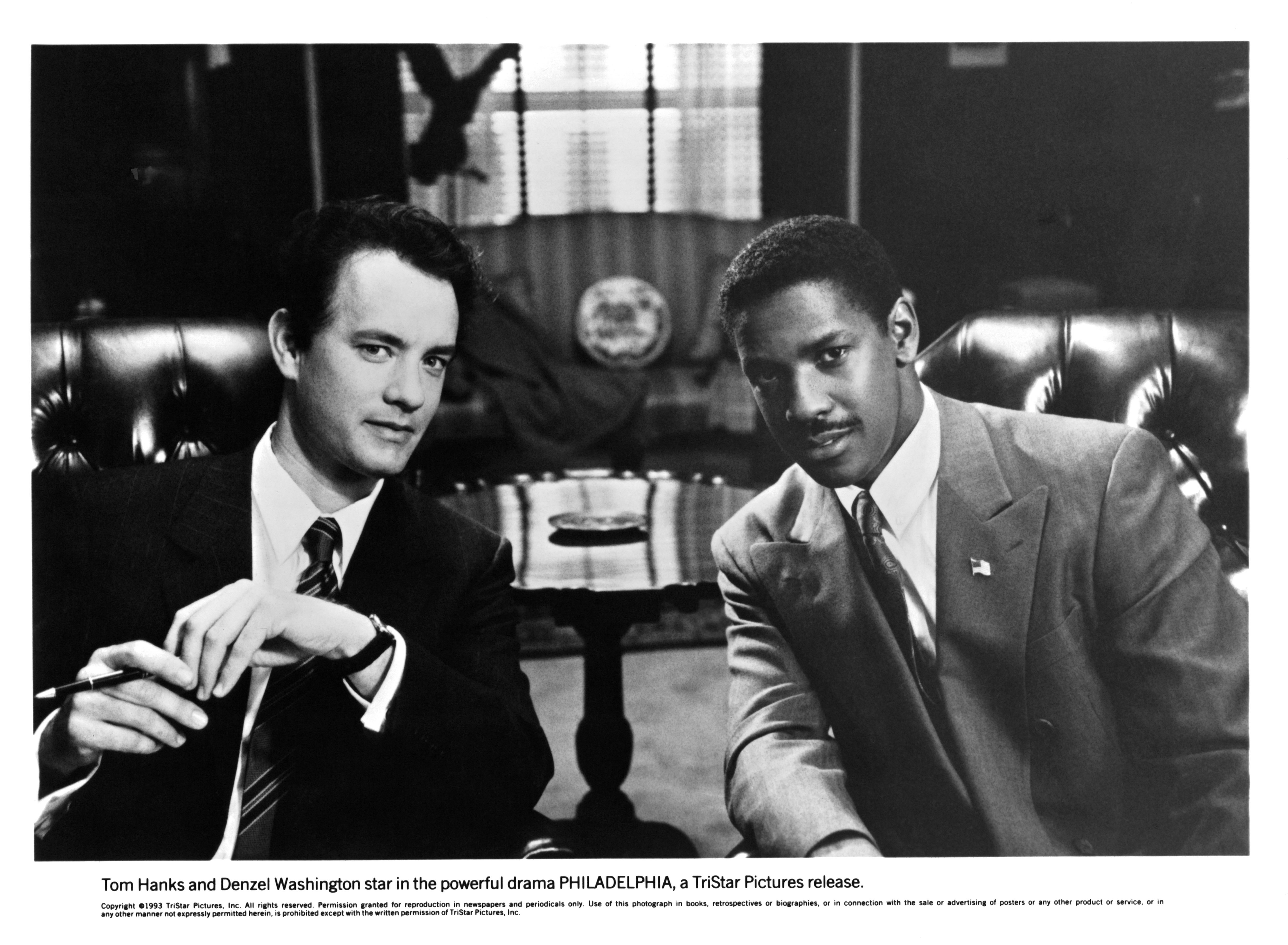 Tom Hanks and Denzel Washington sit in an office in Philadelphia
