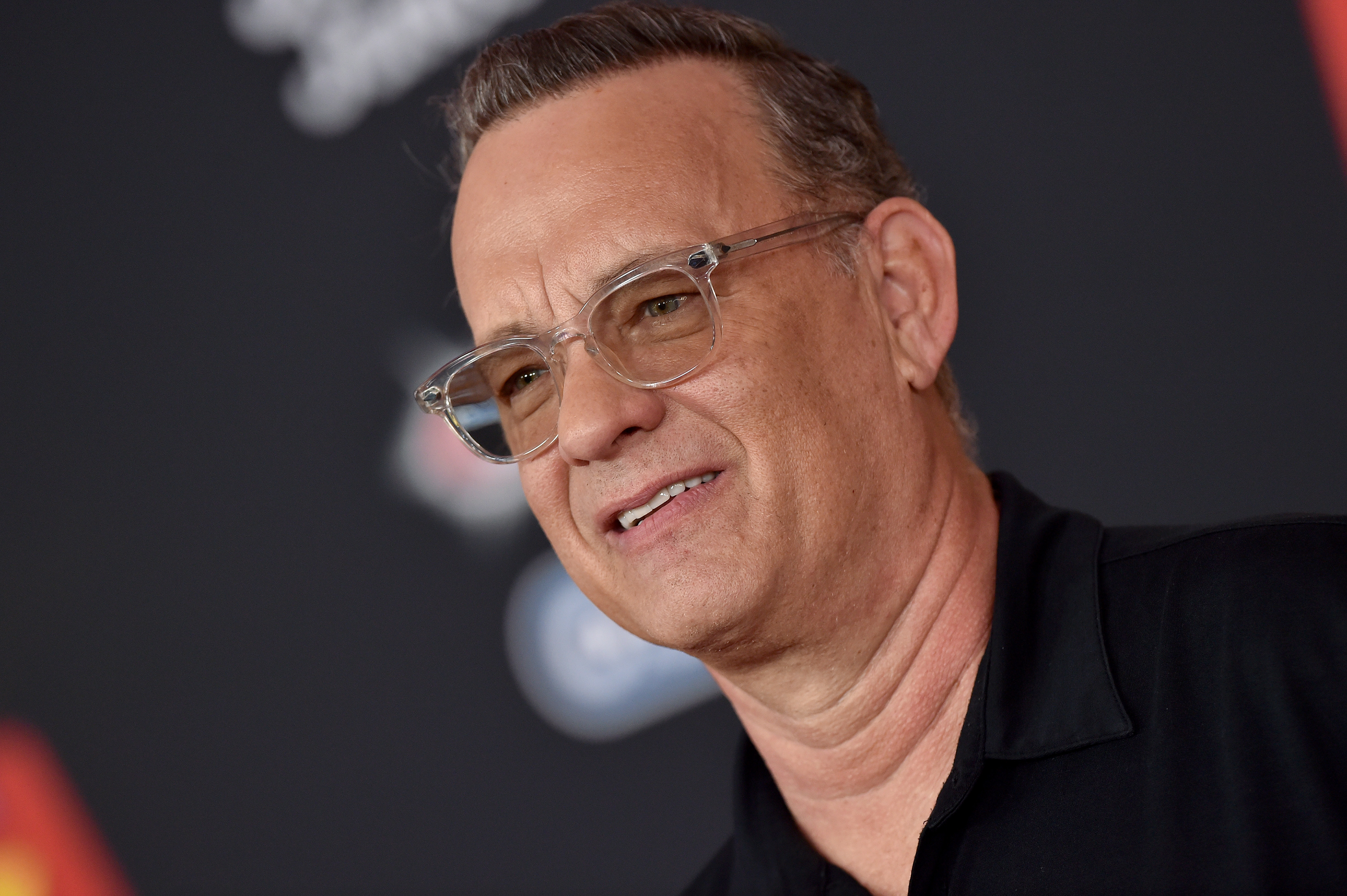 Tom Hanks wearing glasses
