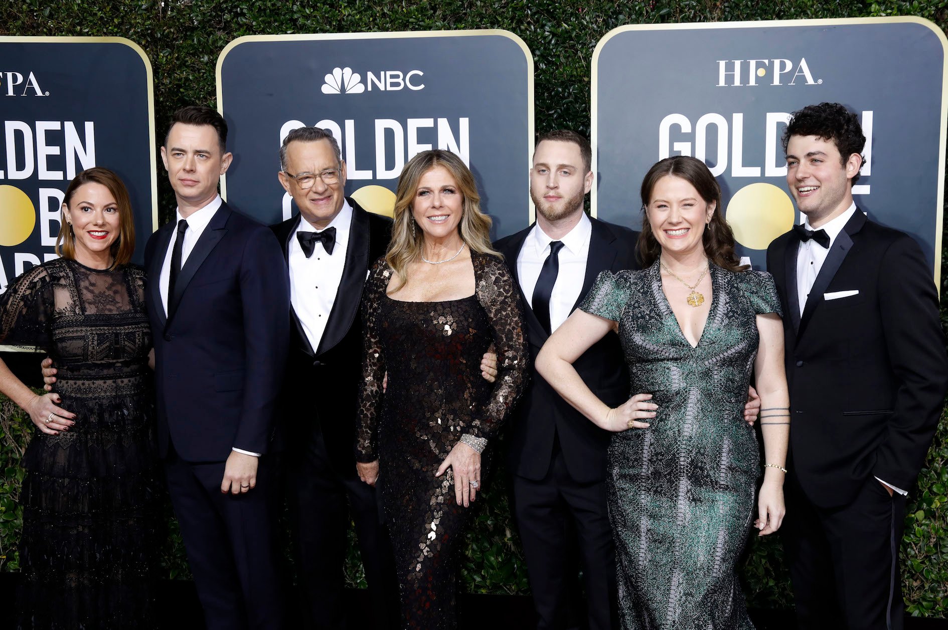 Samantha Bryant, Colin Hanks, Rita Wilson, Tom Hanks, Elizabeth Ann Hanks, Chet Hanks, and Truman Theodore Hanks standing together on the red carpet