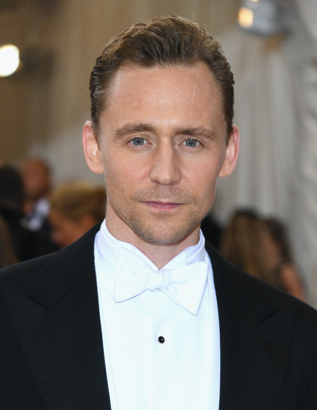 Tom Hiddleston profile in tuxedo