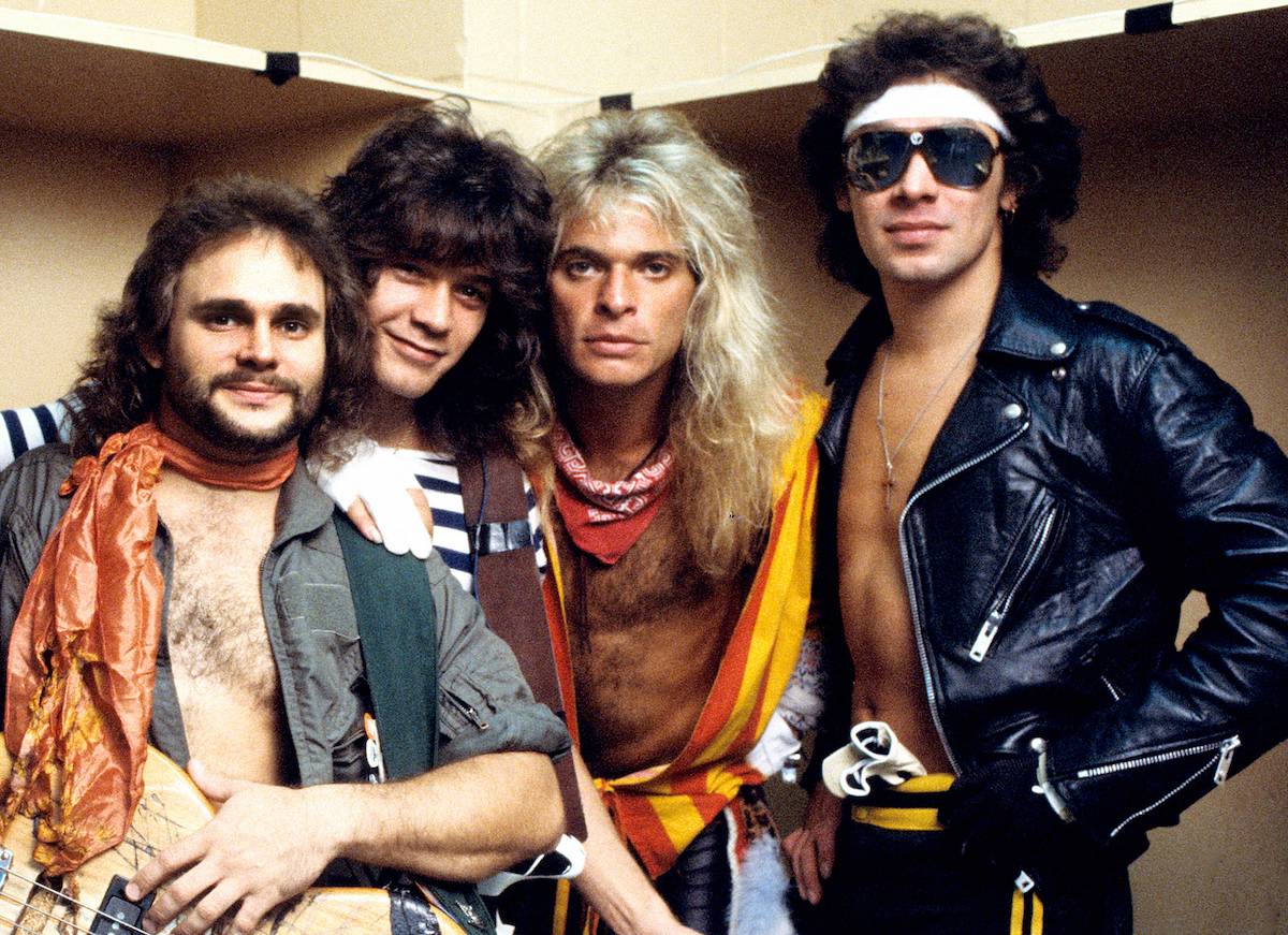 Van Halen bandmates Michael Anthony, Eddie Van Halen, David Lee Roth, and Alex Van Halen pose for a group portrait backstage on January 1, 1981