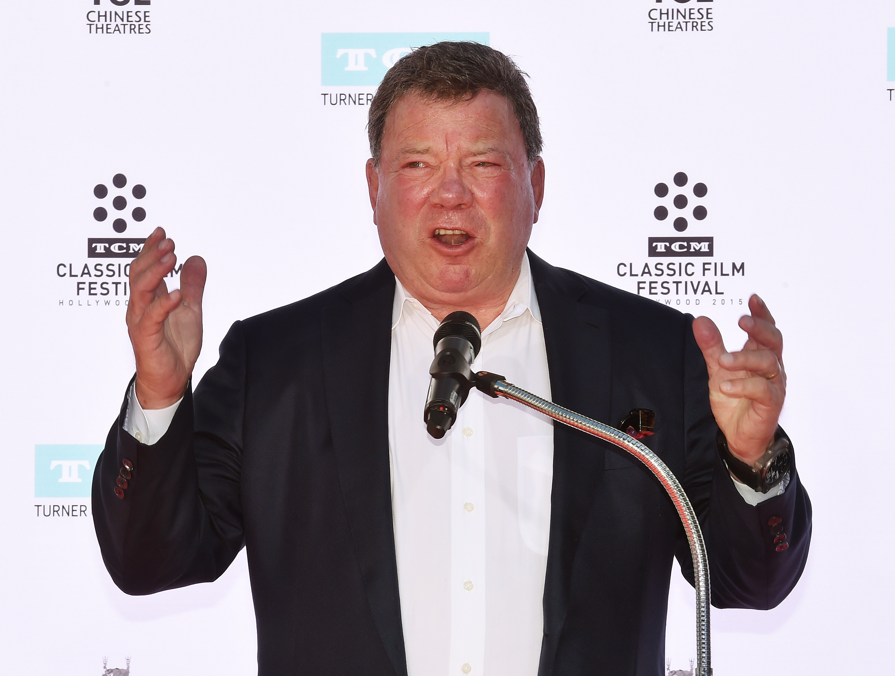 William Shatner speaking to a crowd in front of the Chinese Theatre in Hollywood, California in 2015.