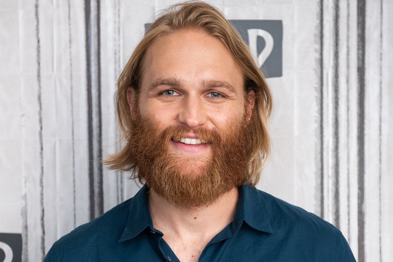 Wyatt Russell smiles while visiting Build Series to discuss 'Lodge 49' at BUILD Studio