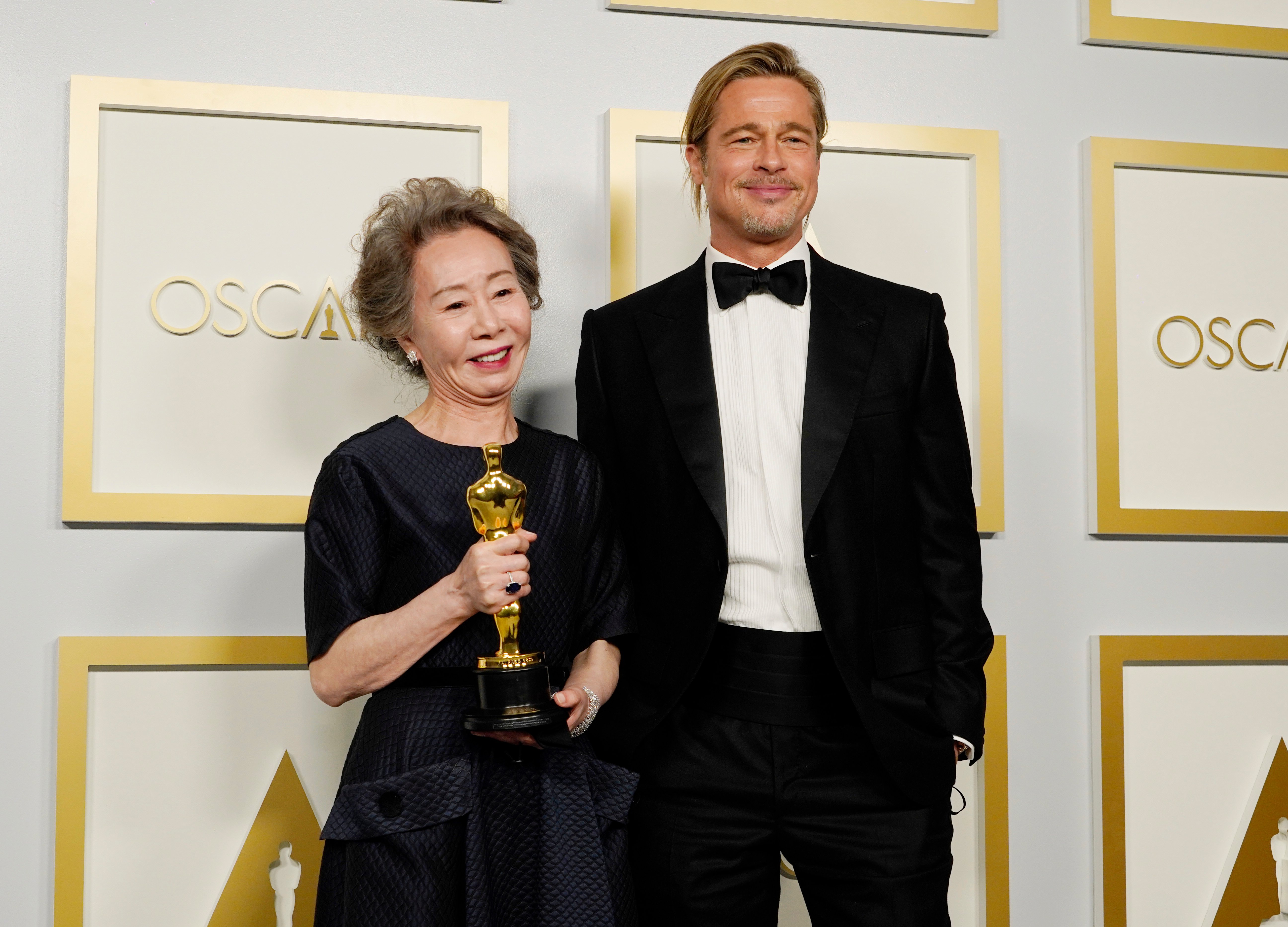 Yuh-Jung Youn and Brad Pitt at the Oscars.