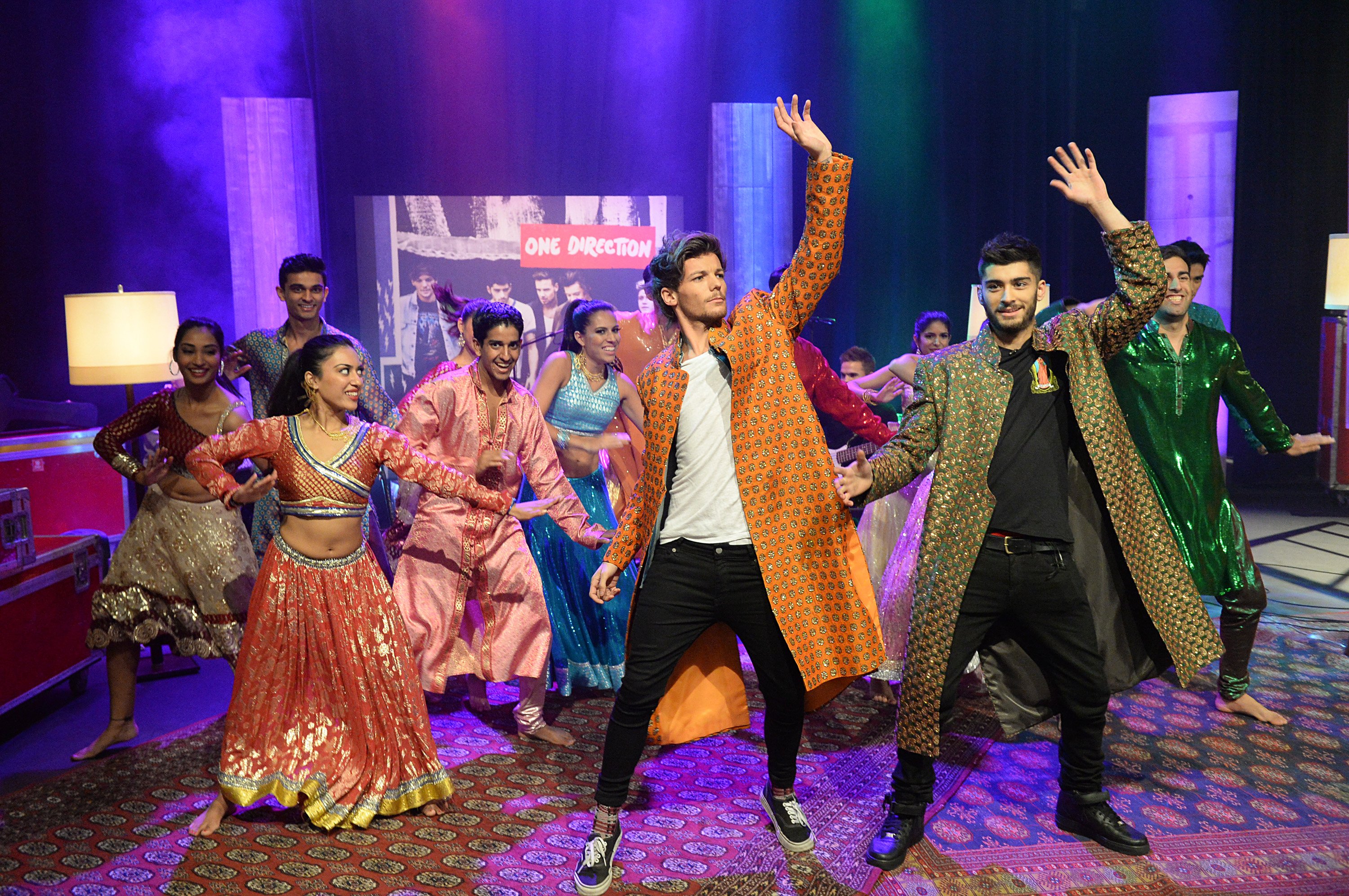 Zayn Malik and Louis Tomlinson dancing during One Direction 1D Day in 2013