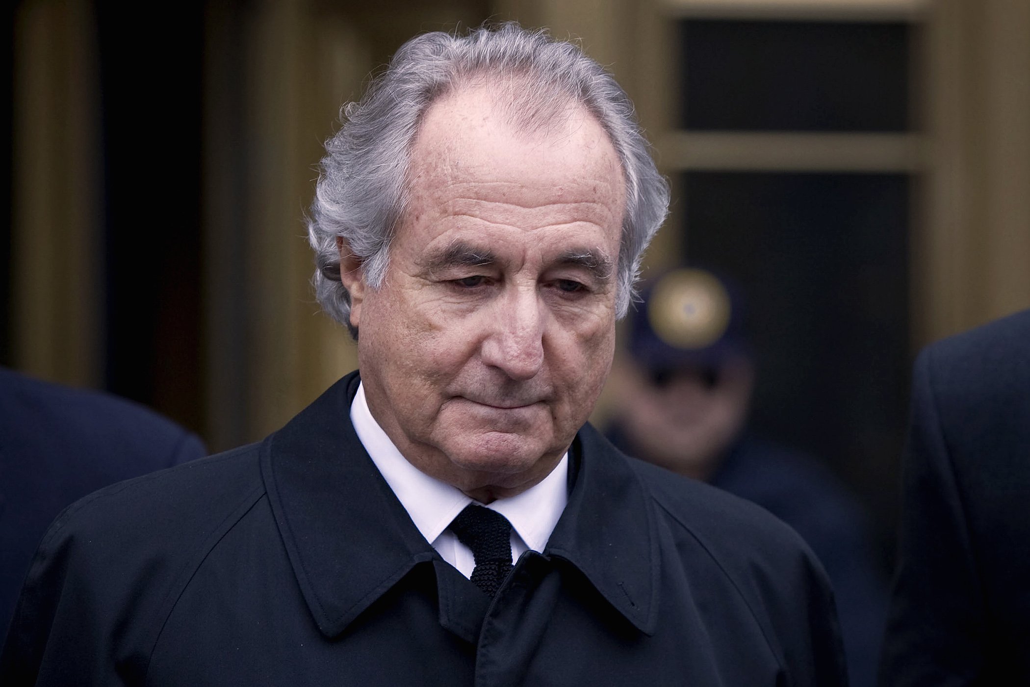 Bernard Madoff leaving court in New York. Bernie Madoff's Ponzi scheme is one of the most notorious in the U.S. 