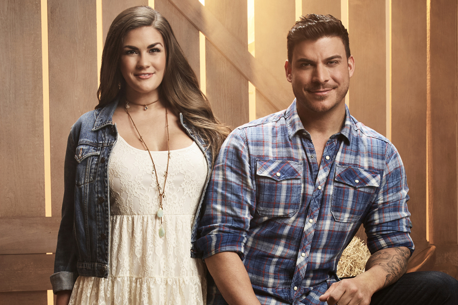 Brittany Cartwright and Jax Taylor in a barn for a promo shot of their 'Vanderpump Rules' spinoff