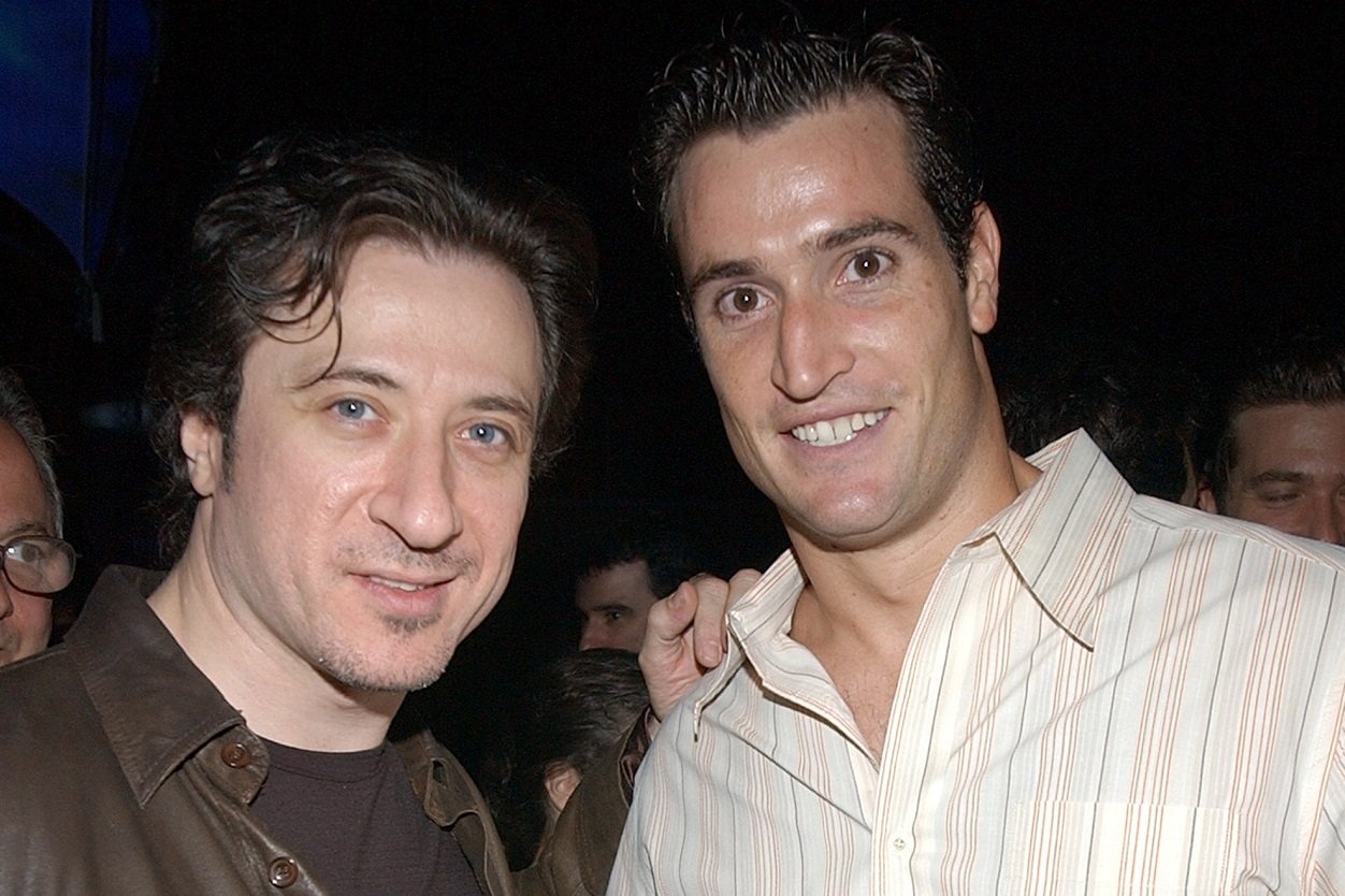 Federico Castelluccio and Matt Del Negro smile for the camera at a media event