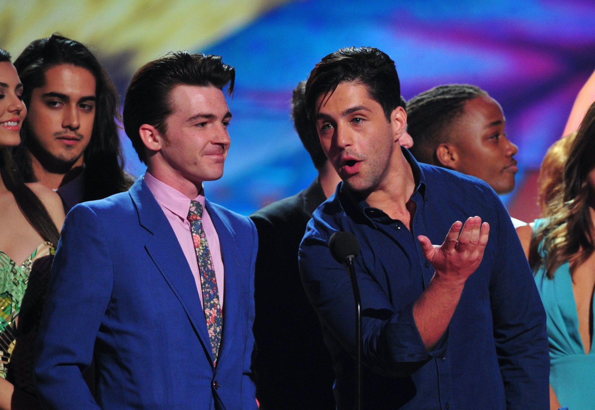 Actors Drake Bell and Josh Peck speak onstage