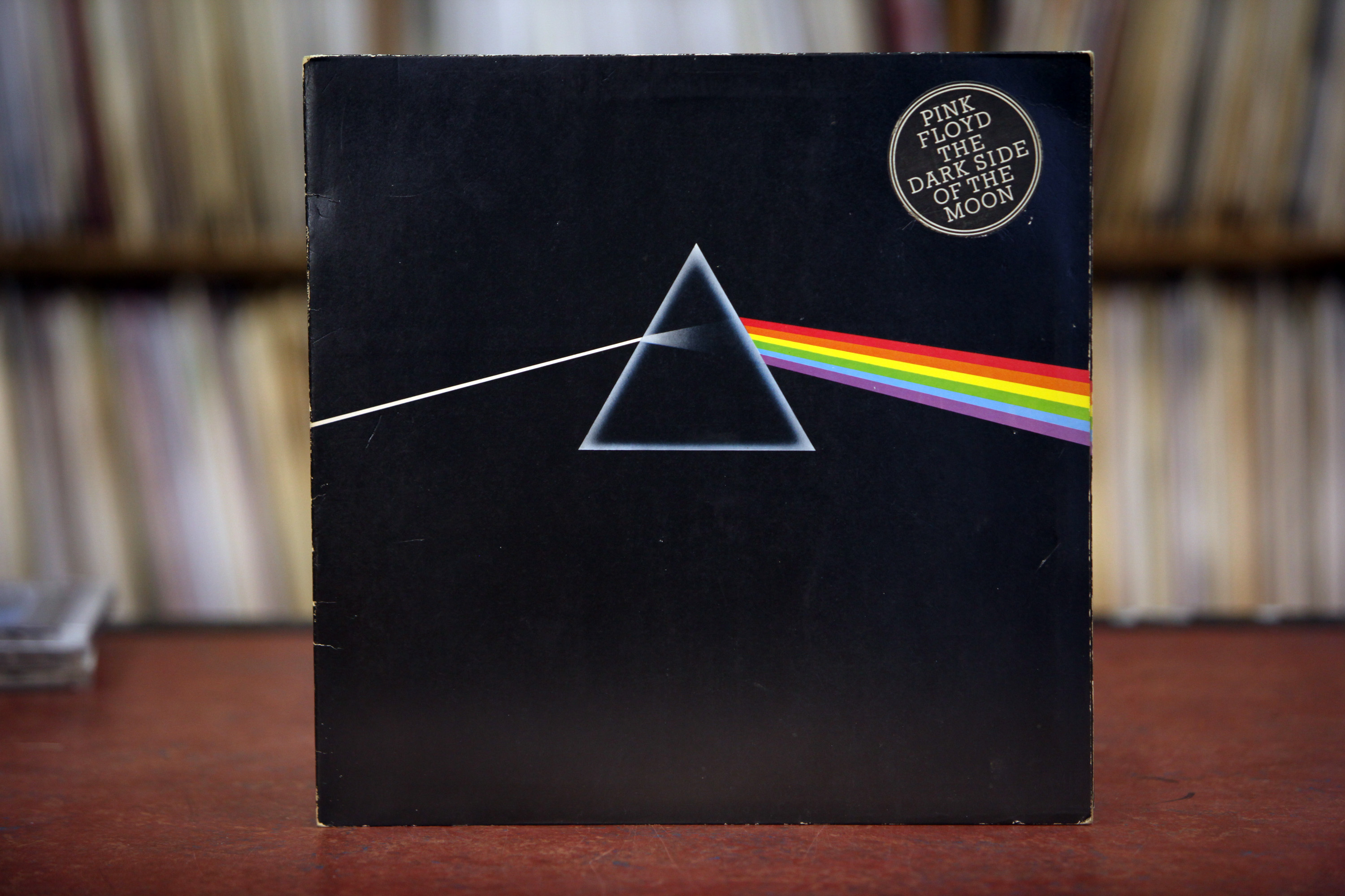 A copy of The Dark Side of the Moon standing upright