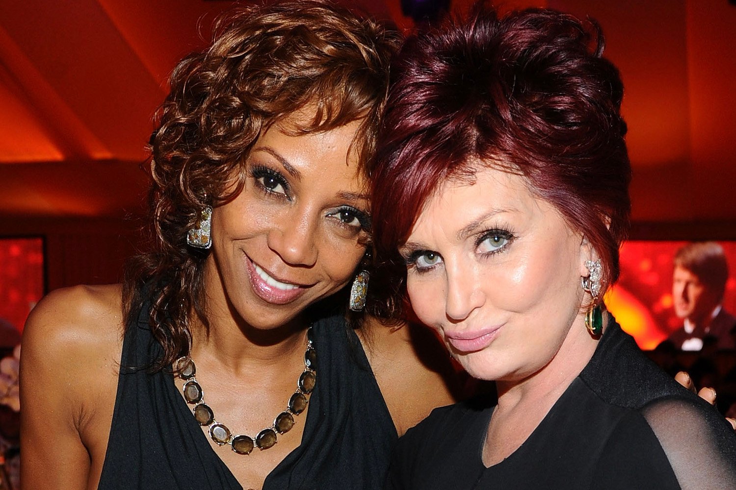 Holly Robinson Peete and Sharon Osbourne share a moment together back in 2011