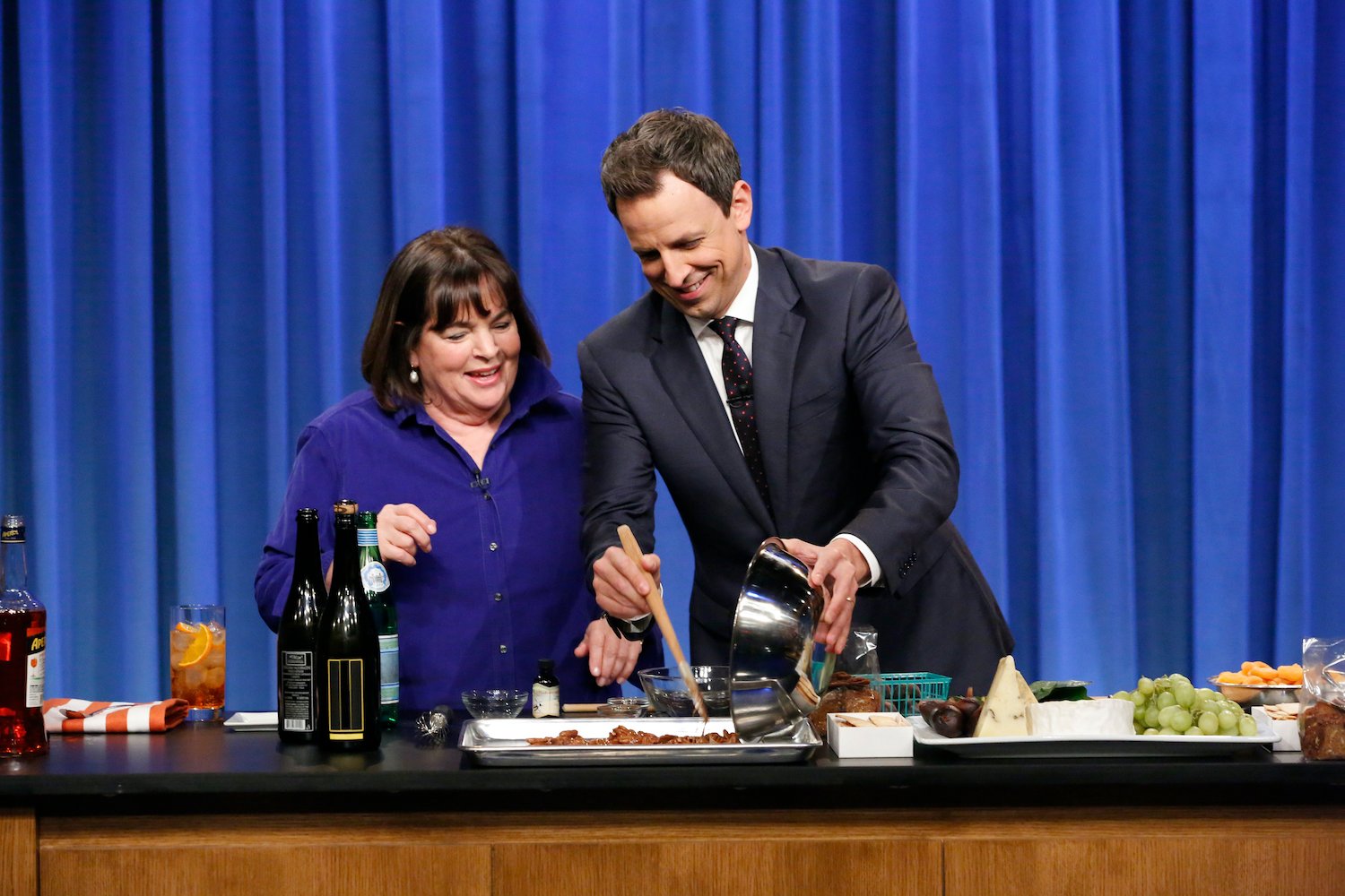 Ina Garten cooks with Seth Meyers during a cooking segment on Late Night With Seth Meyers