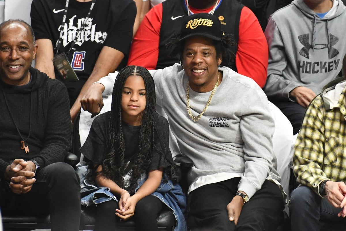 Jay-Z and Blue Ivy Carter attend a basketball game between the Los Angeles Clippers and the Los Angeles Lakers, March 2020