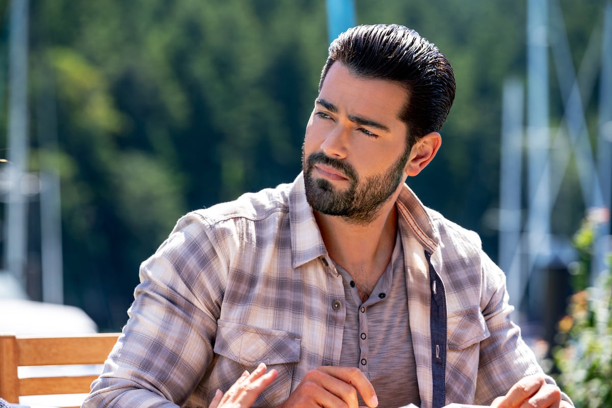 Jesse Metcalfe, as Trace, wearing plaid shirt in Chesapeake Shores 