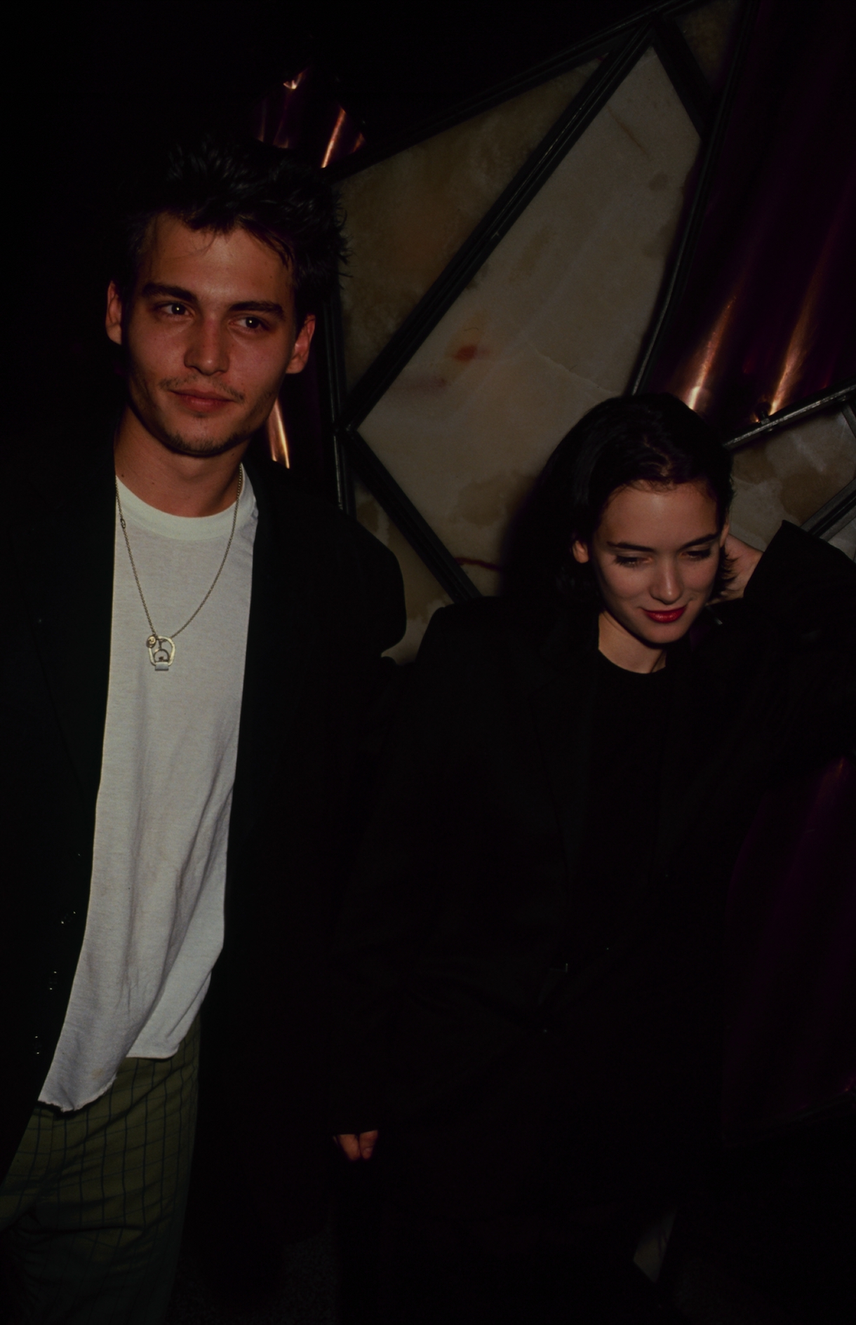 American actress Winona Ryder with her boyfriend, actor Johnny Depp, circa 1990