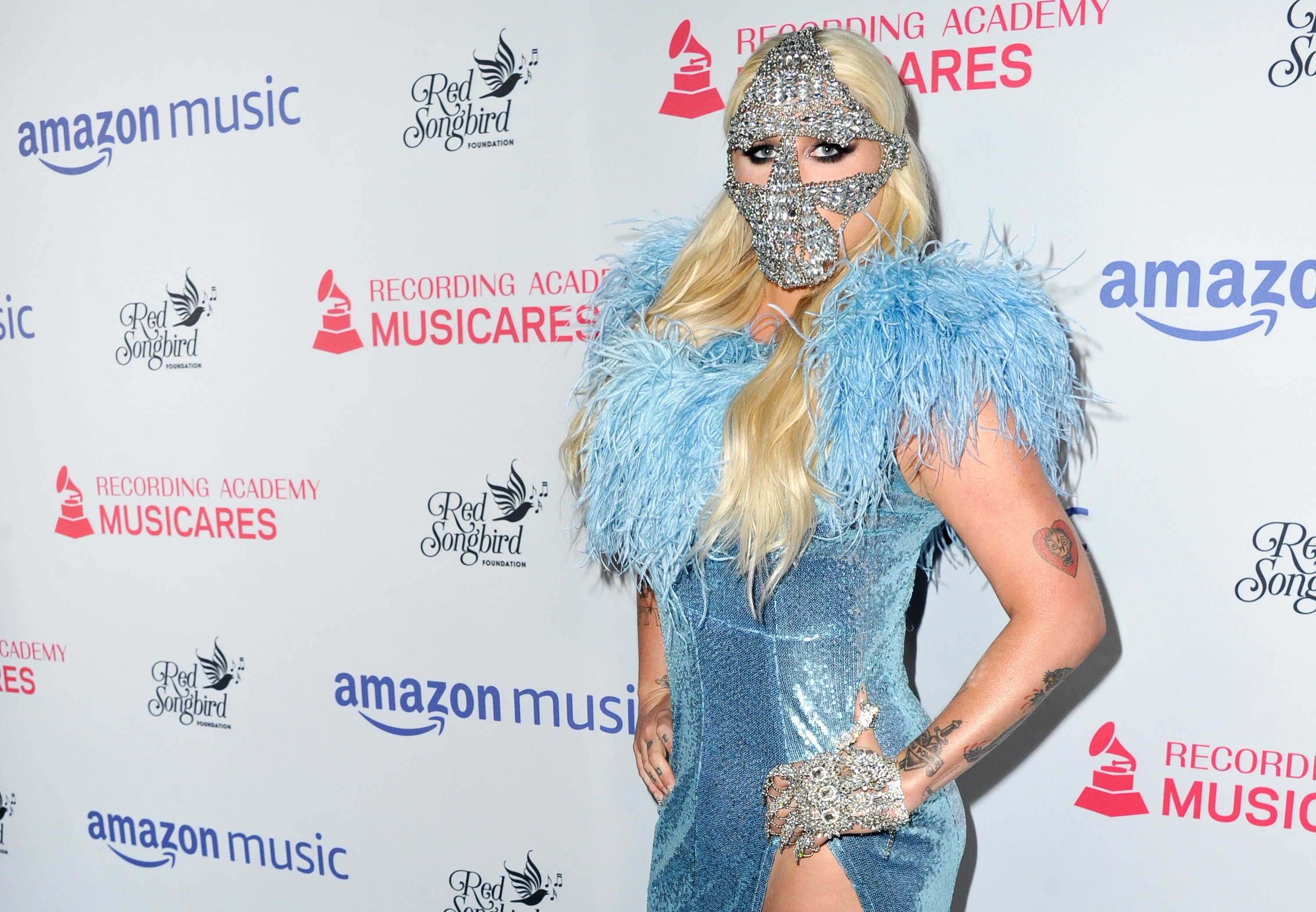 Kesha wearing a mask