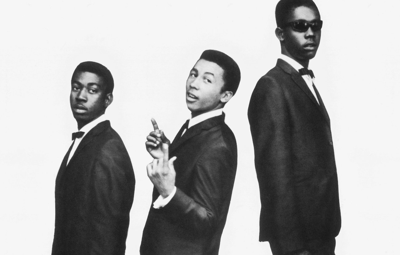 The Wailers pose in dark suits and ties in 1964