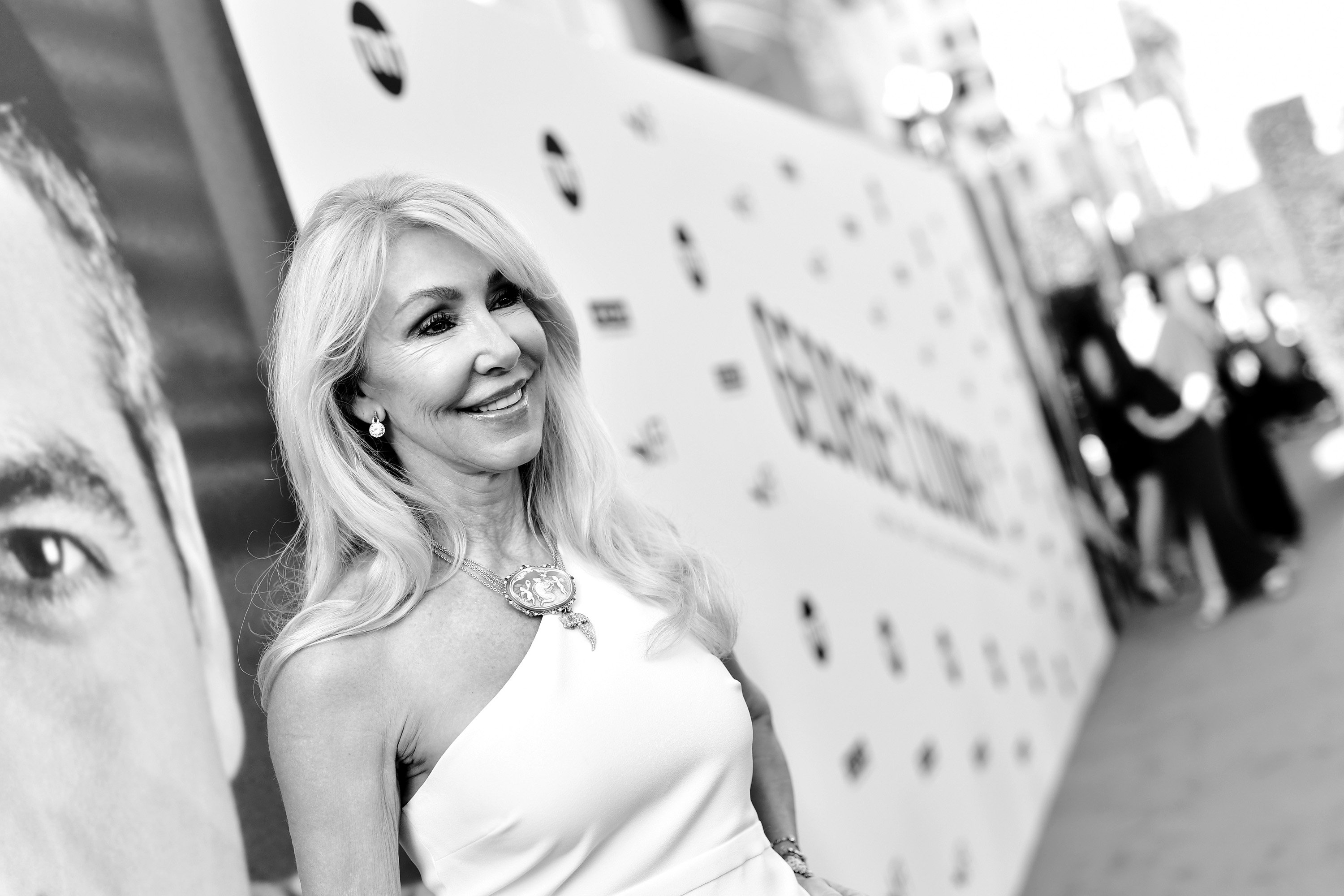 Linda Thompson wearing a dress