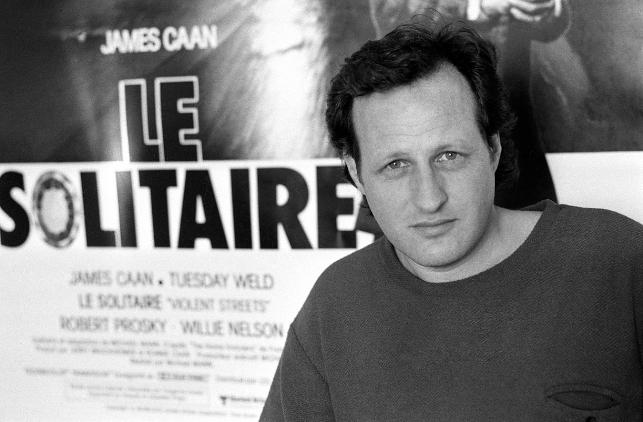 Michael Mann stares into the camera at the 1981 Cannes film festival.