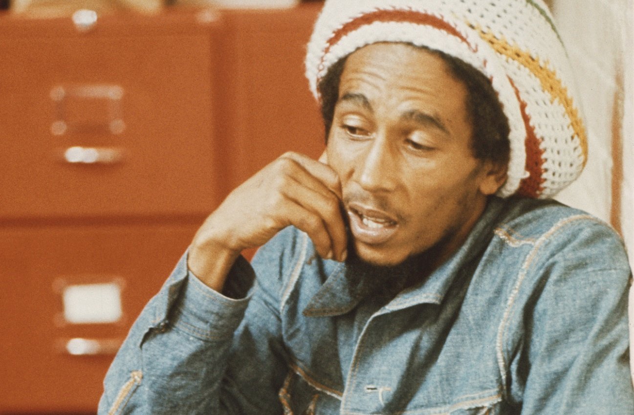 Bob Marley wearing a denim jacket and knit cap at the offices of Island Records, July 1975