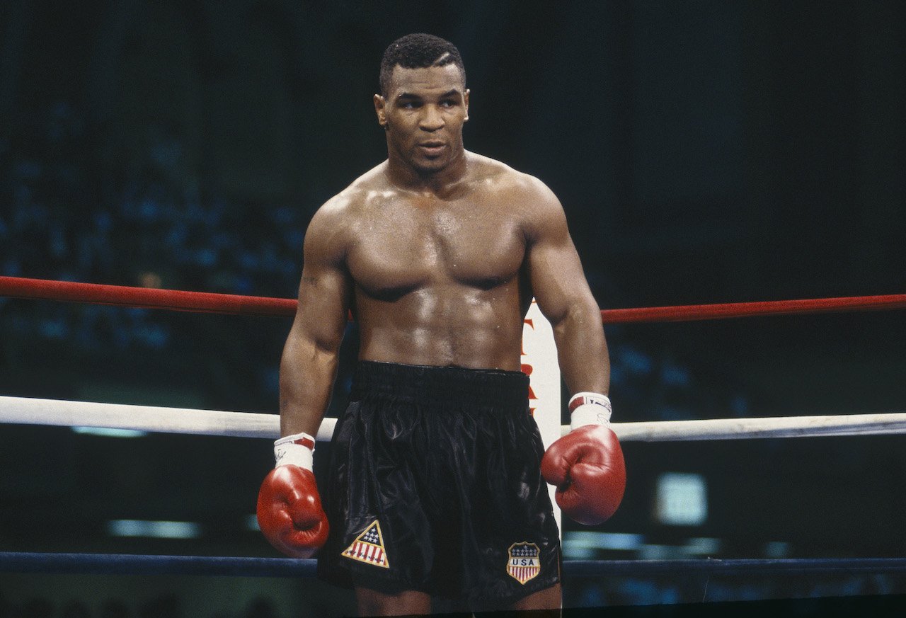 Mike Tyson stands in the ring during the fight with Carl Williams at the Convention Center