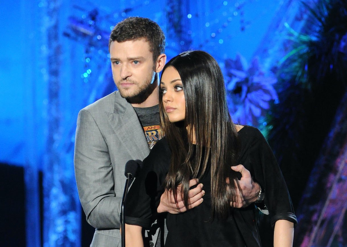 Actor/singer Justin Timberlake and actress Mila Kunis speak onstage during the 2011 MTV Movie Awards at Universal Studios' Gibson Amphitheatre on June 5, 2011 in Universal City, California