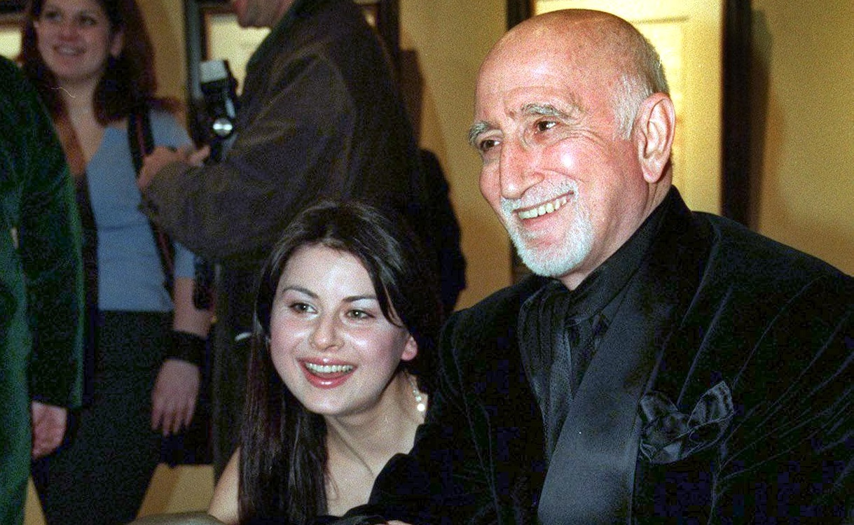 Oksana Lada and Dominic Chianese smile for the camera in 2000.