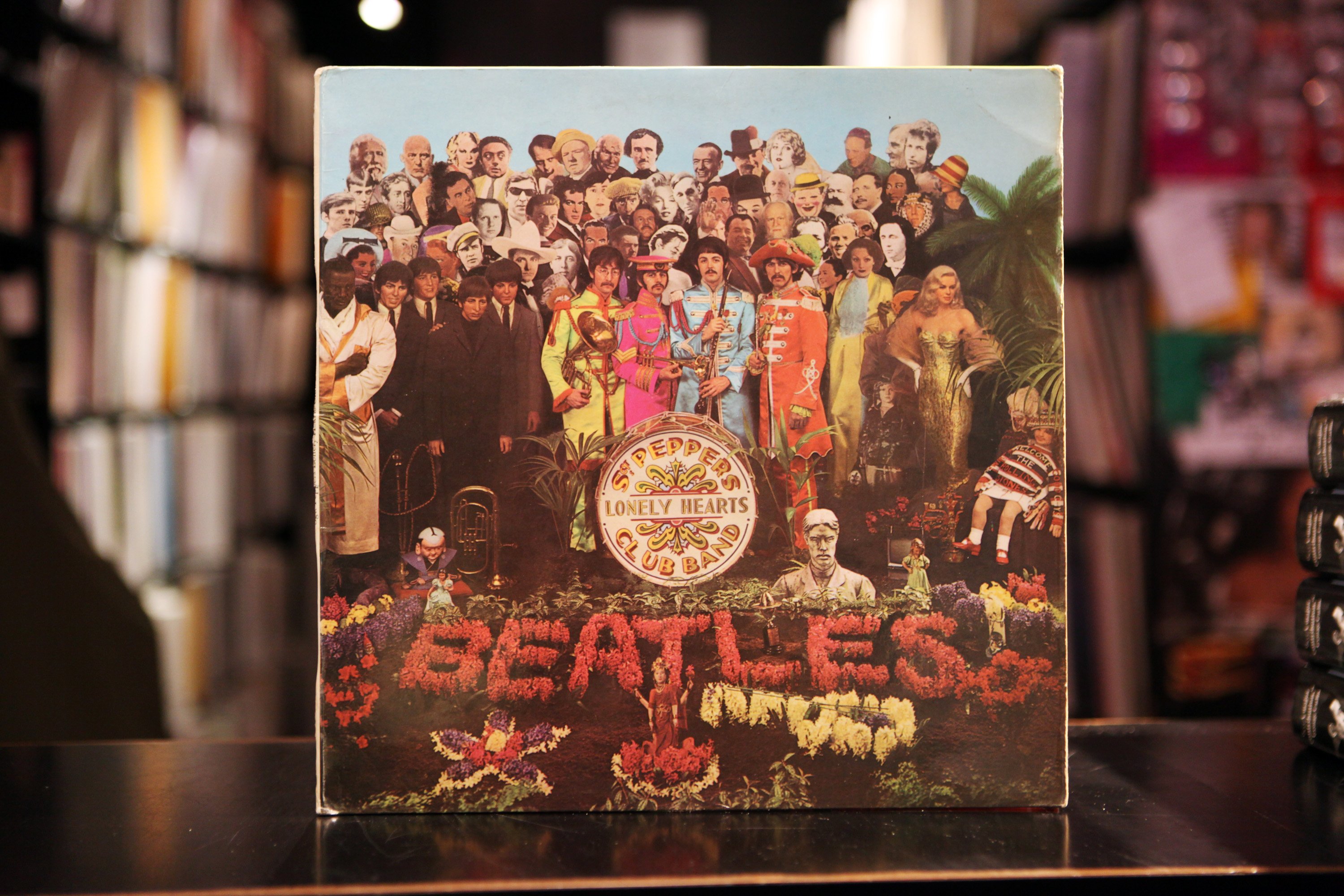 A copy of The Beatles' Sgt. Pepper's Lonely Hearts Club Band standing upright