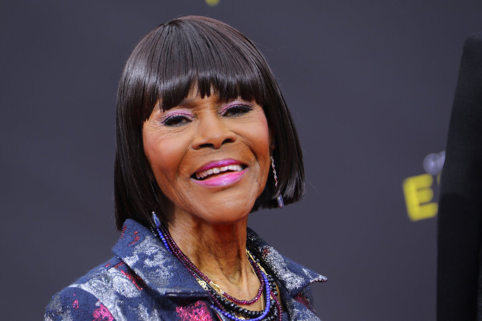 Cicely Tyson posing for a photograph on the red carpet.